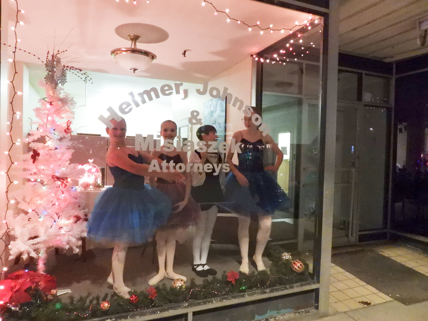 The city of Oneida welcomed in the holiday season with its second annual Parade of Lights, annual tree lighting, and a visit from Santa Claus. Stores and businesses across Oneida were decorated, and members of the Bogardus Performing Arts Center took stage as living window displays.