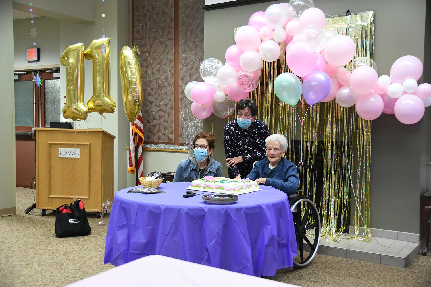 Marguerite Redmond (right) celebrated her 110th birthday on Thursday, Dec. 1 with her family and a crowd of residents and staff at Mohawk Valley Health System's Rehabilitation and Nursing Center.