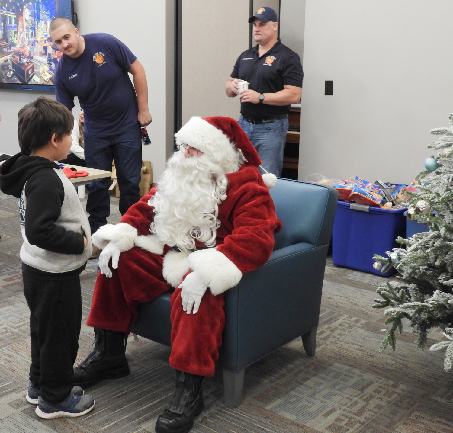 The Oneida Fire Department brings a little Christmas cheer to area children with the help of Santa Claus, listening to their Christmas wishes and giving them a toy and some treats to take home on Saturday, Dec. 3.