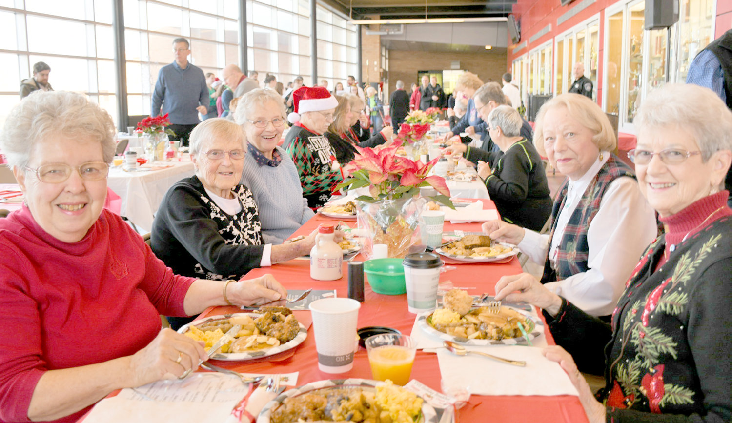 Diners enjoy the Senior Citizens Holiday Breakfast at the VVS Sheveron Community Center in 2019. The free event returns Dec. 22.