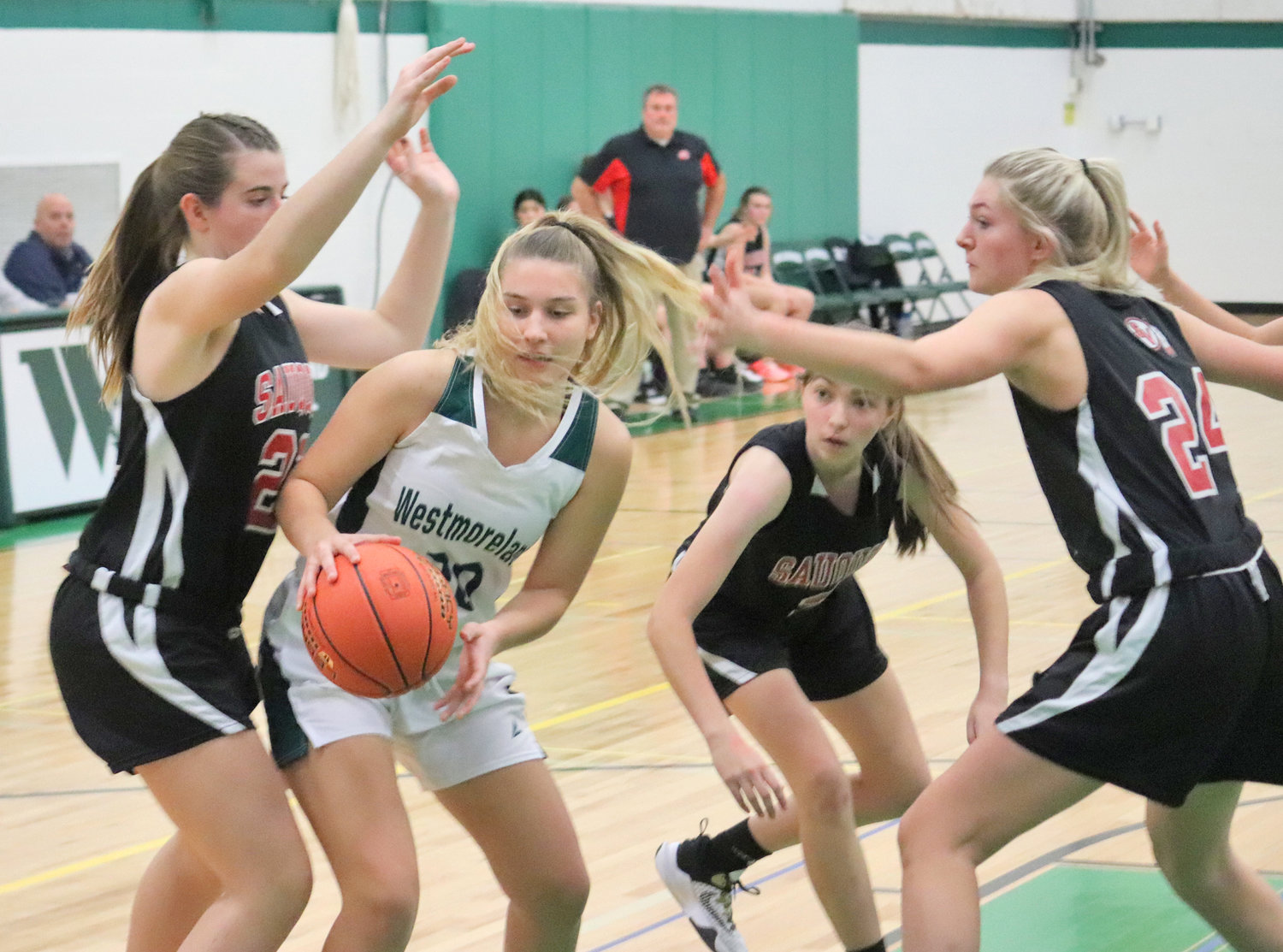 Molly Nestved of Westmoreland drives to the basket surrounded by Sauquoit Valley defenders. At left is Makayla Land and closing in on the right is Sydney Nattress. Nestved had a pair of rebounds to help the team to a 55-29 win.