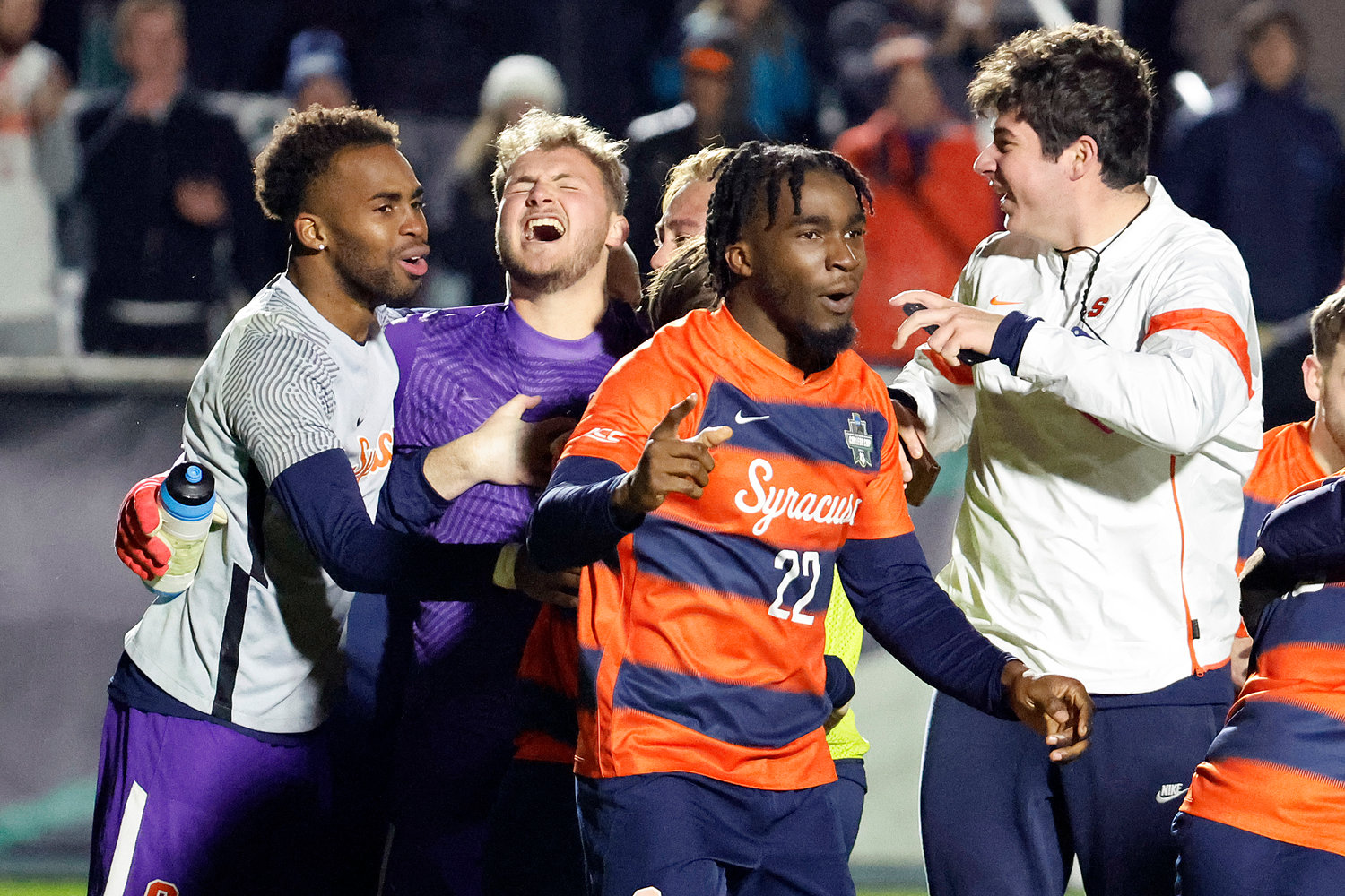 Syracuse players celebrate including goalie Russell Shealy, second from left, after winning the NCAA College Cup championship against Indiana on Monday in Cary, N.C.