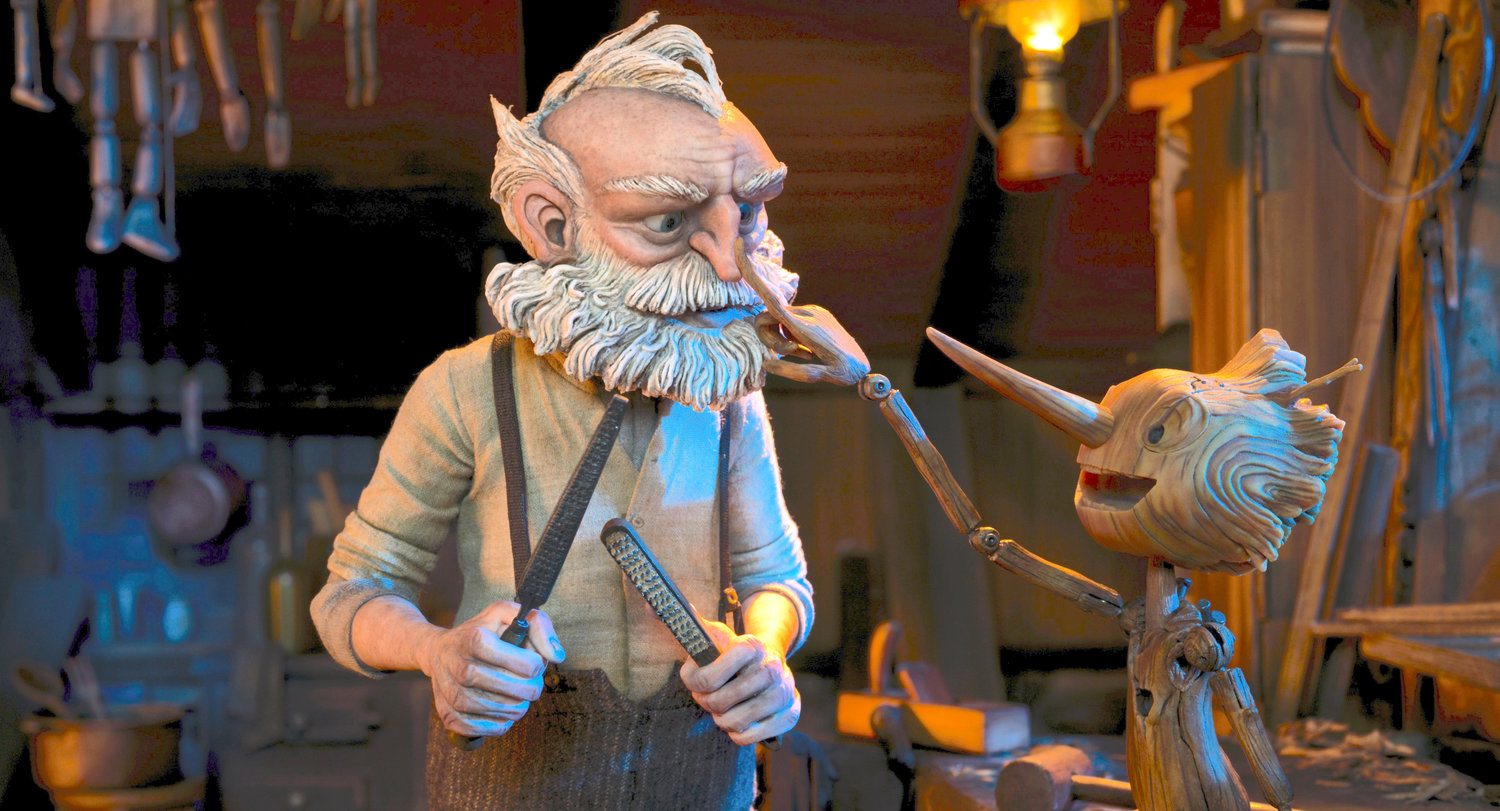 Gepetto, voiced by David Bradley, left, and Pinocchio, voiced by Gregory Mann, in a scene from “Guillermo del Toro’s Pinocchio.”