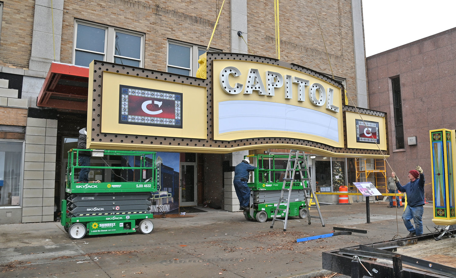Installation of the new recreated marquee is installed by Wagner Electric Signs at Capitol Theatre, and included the 45 1/2 foot “blade” sign. The official unveiling of the new marquee that had been almost 20 years in the works, was held in January.