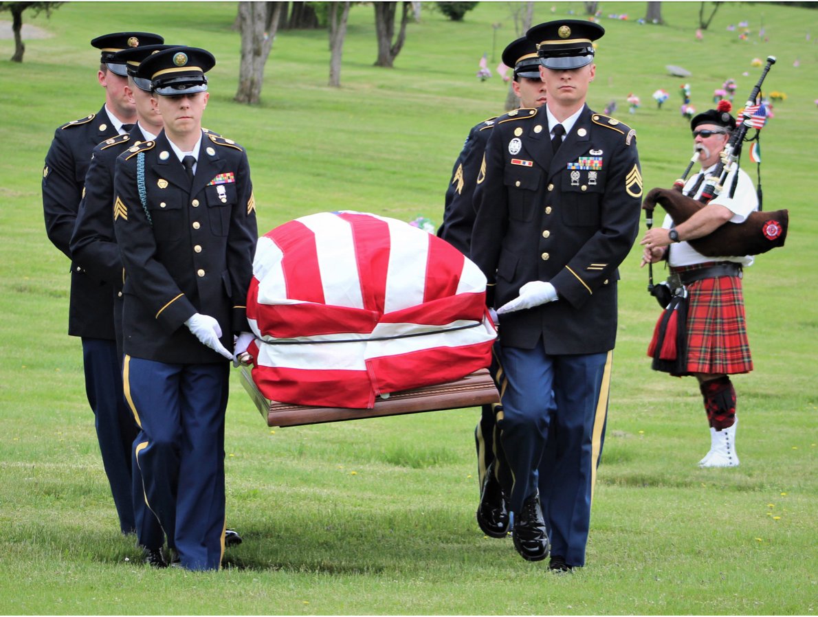New York Army National Guard Soldiers carry the remains of Korean War MIA Cpl. Robert Charles Agard Jr. on May 27, 2022 at the Forest Lawn Memorial Park Cemetery in Elmira. Agard’s remains were returned home after more than 70 years listed as missing in action following his death in North Korea. The New York Army National Guard conducted 7,753 military funerals during 2022.