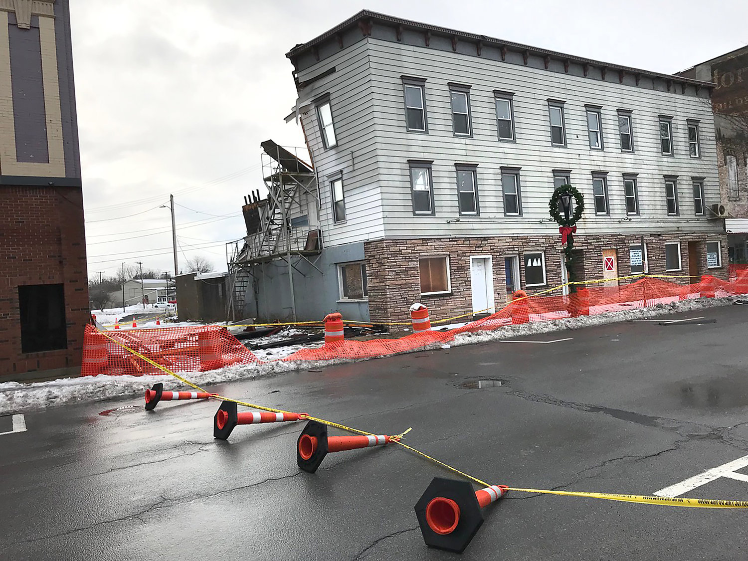 Madison Street in Oneida was closed temporarily from Main Street to Williams Street after a building collapse Dec. 22 at the site of the former Madison House Restaurant.