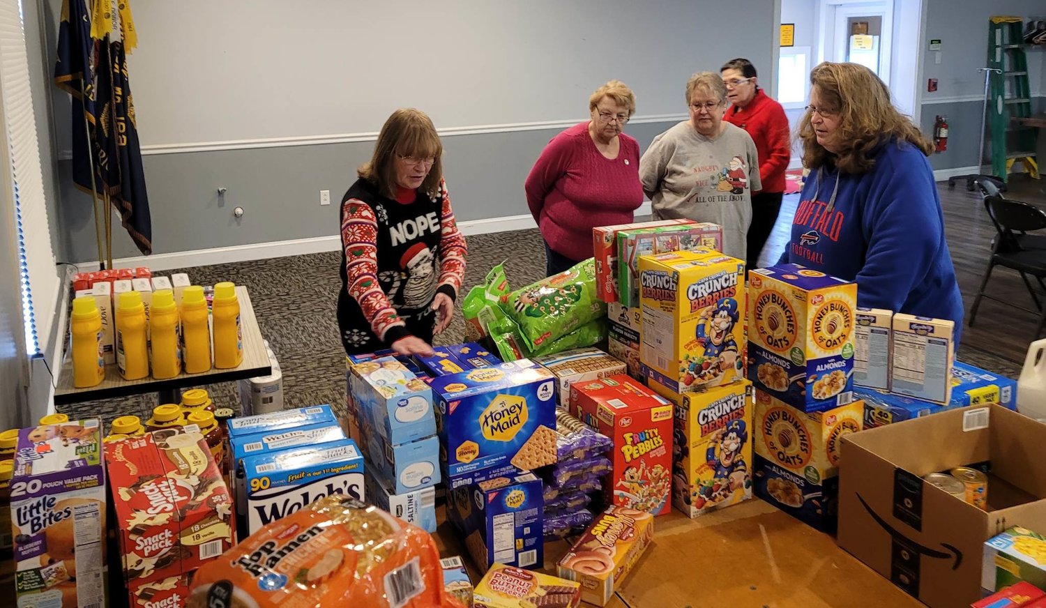 Sorting items recently for their Fill Um Up Project are, from left, Oneida American Legion Auxiliary Vice President Sue Fid, auxiliary Secretary Pauline Gormley and auxiliary members Patti White, Tracey Collins and Janet Zimmerman.