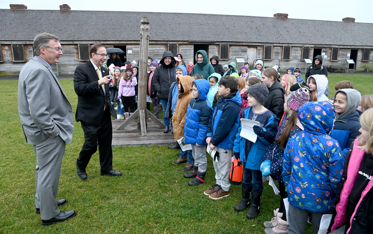 NY assemblyman Brian Millerand NY State senator Joe Griffo with children from  Camden Elementary School are Friday, January 6, 2023 at Fort Stanwix National Monument.