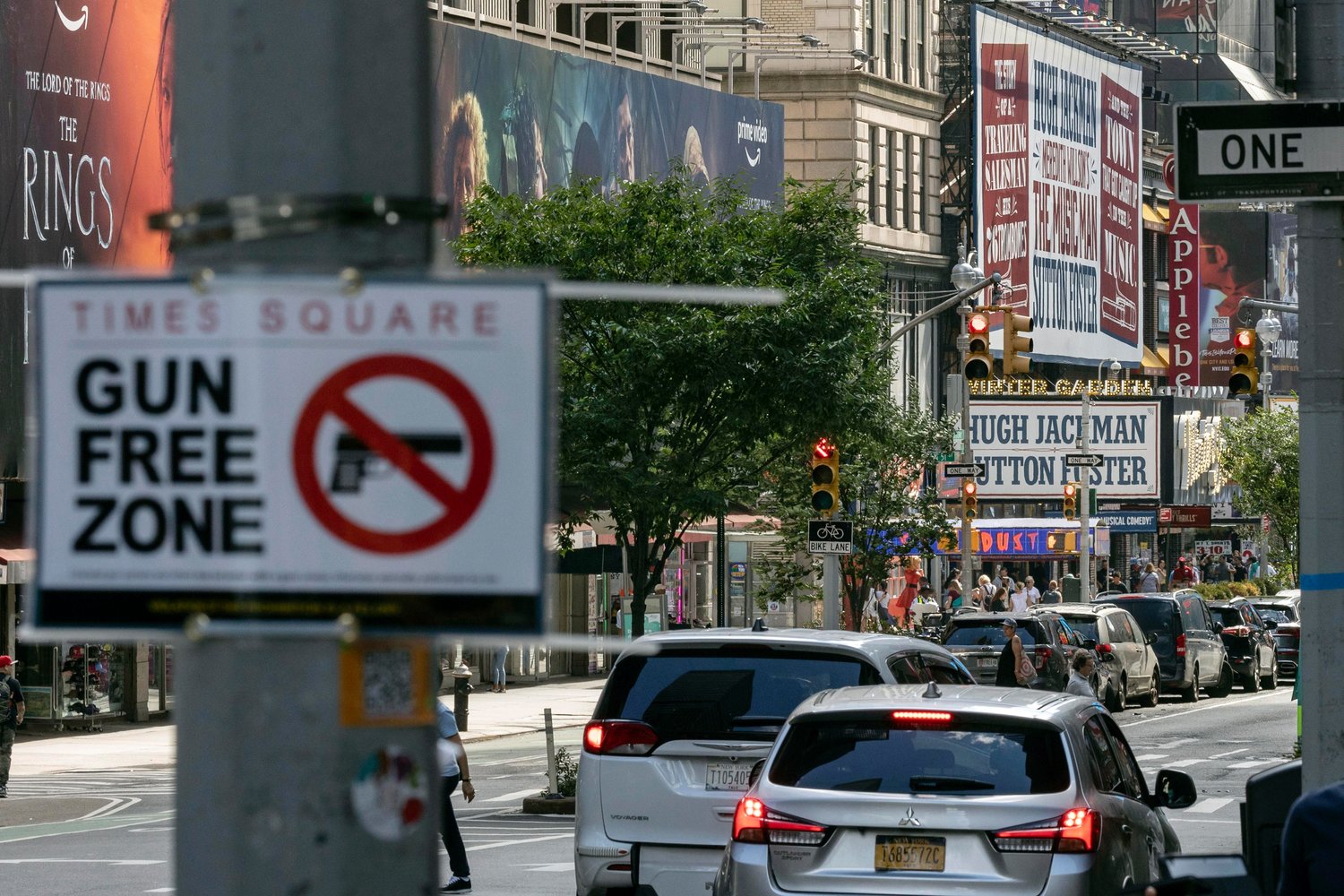 FILE - A sign reading "Gun Free Zone" is posted near around Times Square, Aug. 31, 2022, in New York. The Supreme Court is allowing New York to continue to enforce a sweeping new gun law banning guns from "sensitive places" for now while a court challenge plays out. The justices on Jan. 11, 2023, turned away a plea by the law's challengers. (AP Photo/Yuki Iwamura, File)