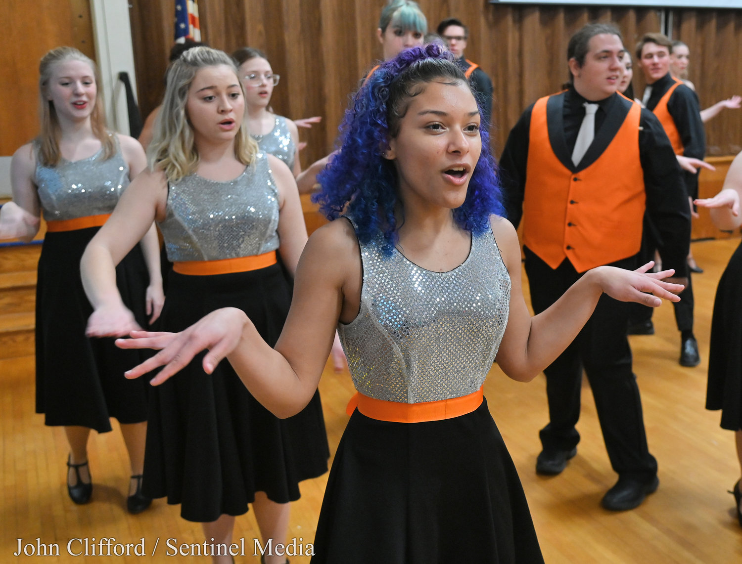 Rome Free Academy Rhapsody Show Choir member Alana DeJosie singing and dancing during the  performance at Clough School Friday, January 13, 2023.