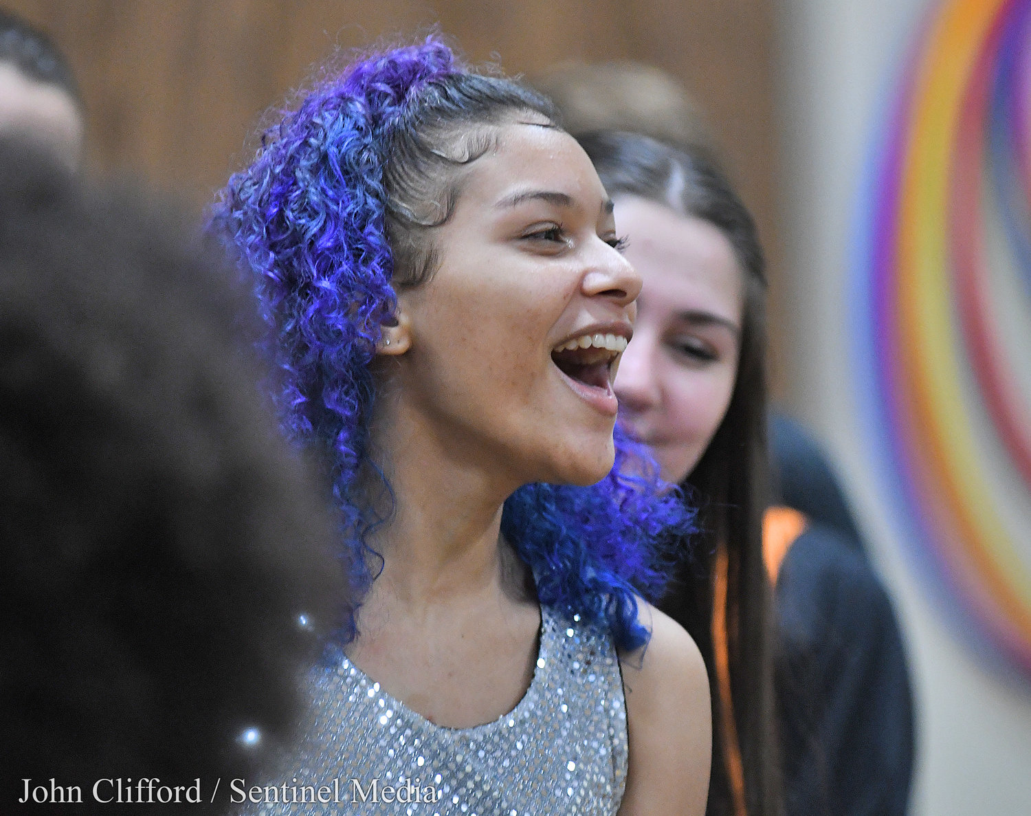 Soloist Alana DeJosie during the Rome Free Academy Rhapsody Show Choir performance at Clough School Friday, January 13, 2023.