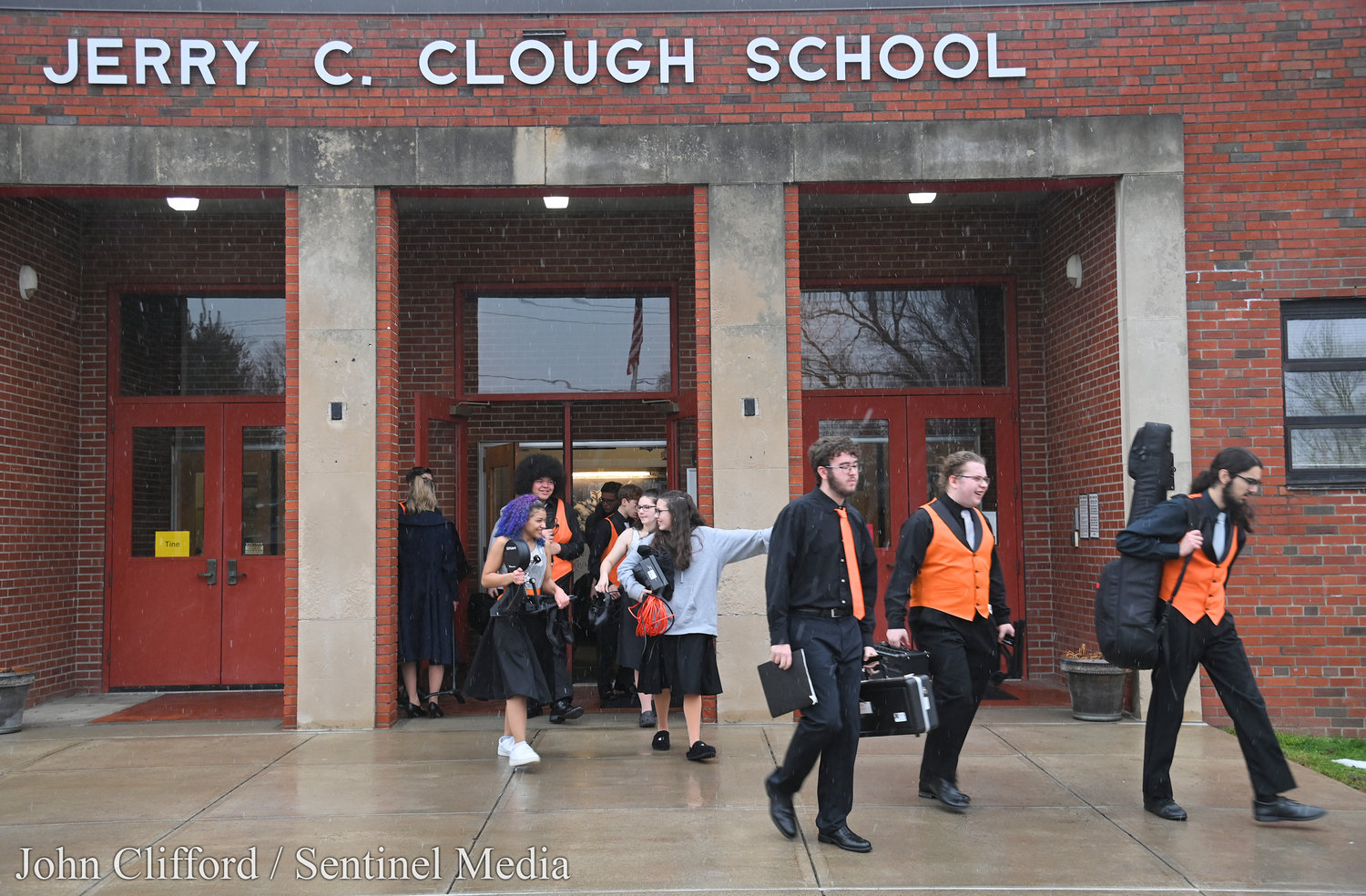 Rome Free Academy Rhapsody Show Choir leaving Clough School after their performance at the school and on to their next performance at Stokes Elementary School Friday, January 13, 2023.