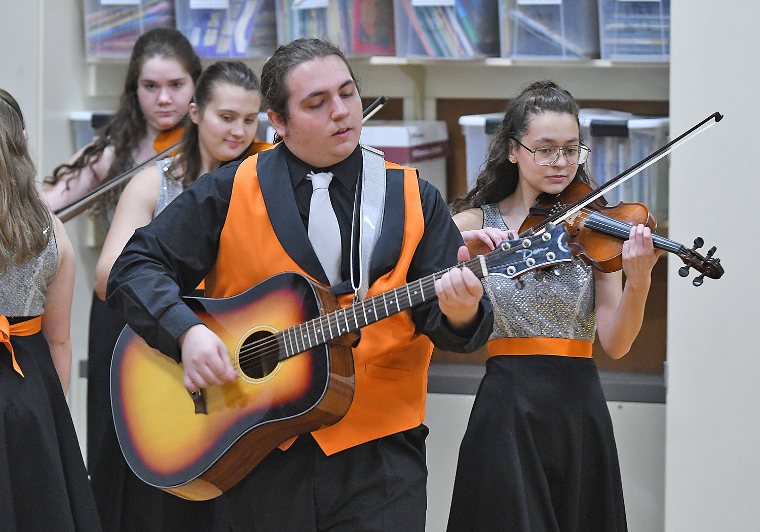 Jake Consentino plays the guitar during Rome Free Academy Rhapsody Show Choir performance Friday, Jan. 13 at Clough School in Rome.