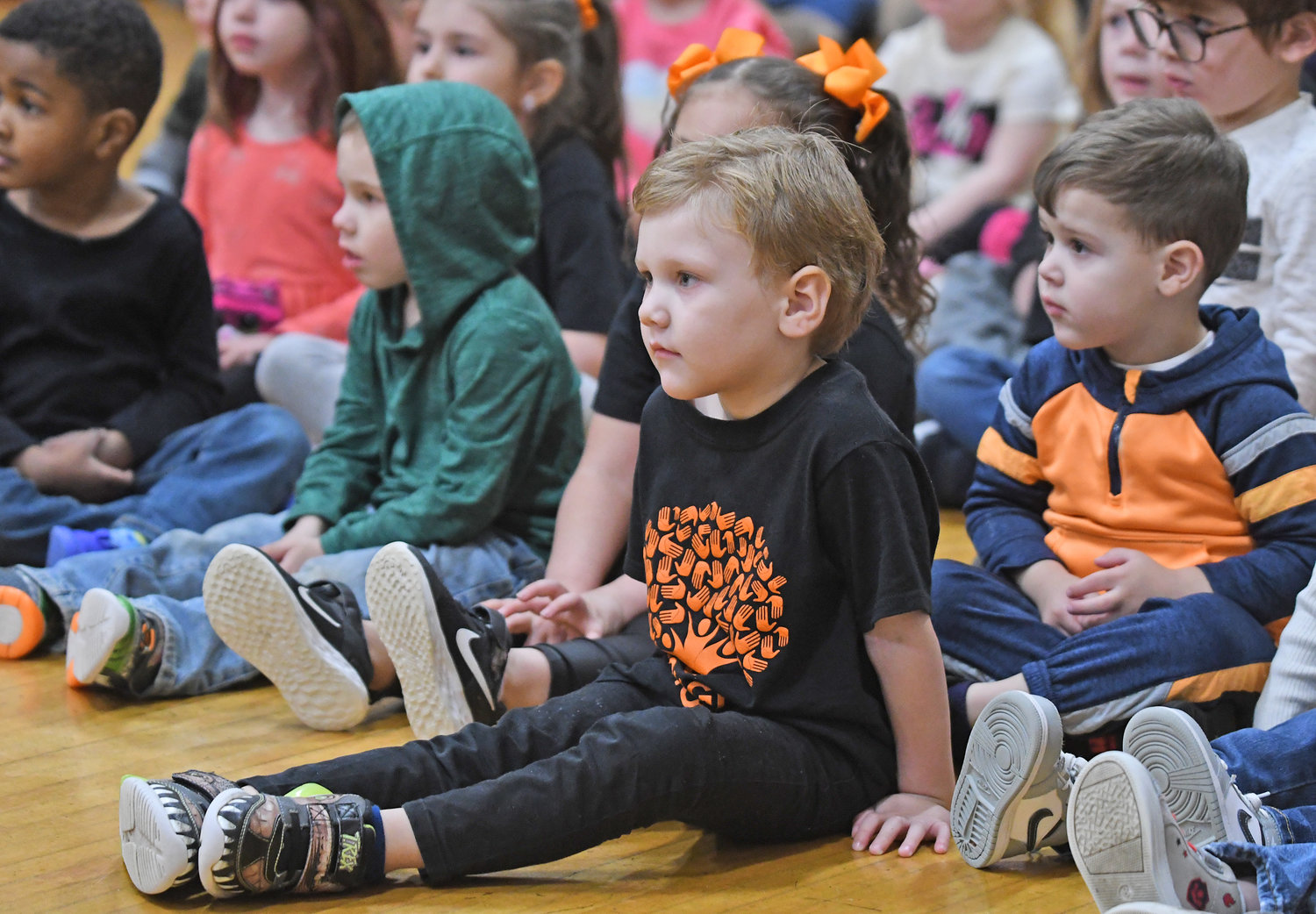 Pre-K students listen to the Rome Free Academy Rhapsody Show Choir's performance Friday, Jan. 13 at Clough School in Rome.