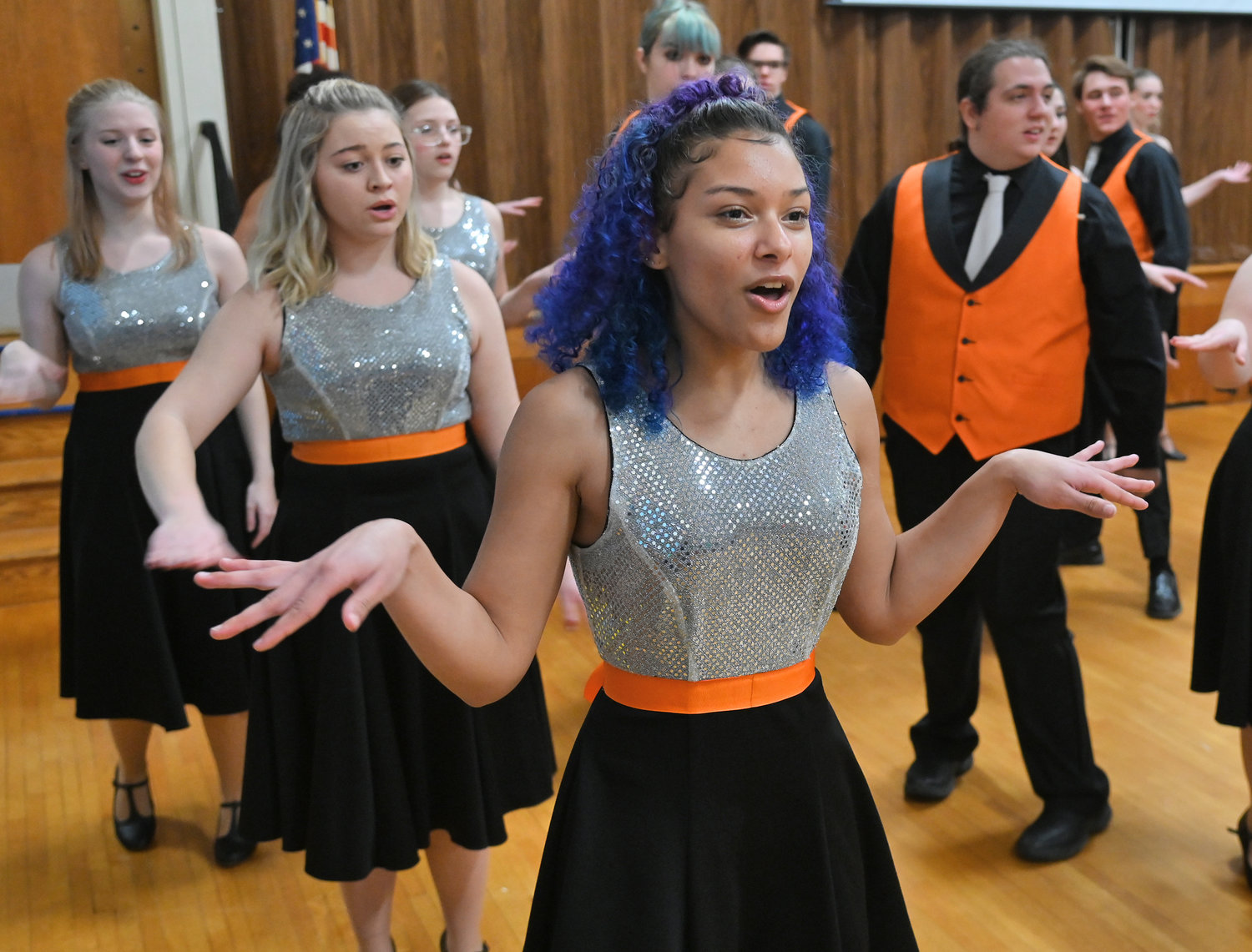 Rome Free Academy Rhapsody Show Choir member Alana DeJosie sings and dances during the  Friday, Jan. 13 performance at Clough School in Rome.