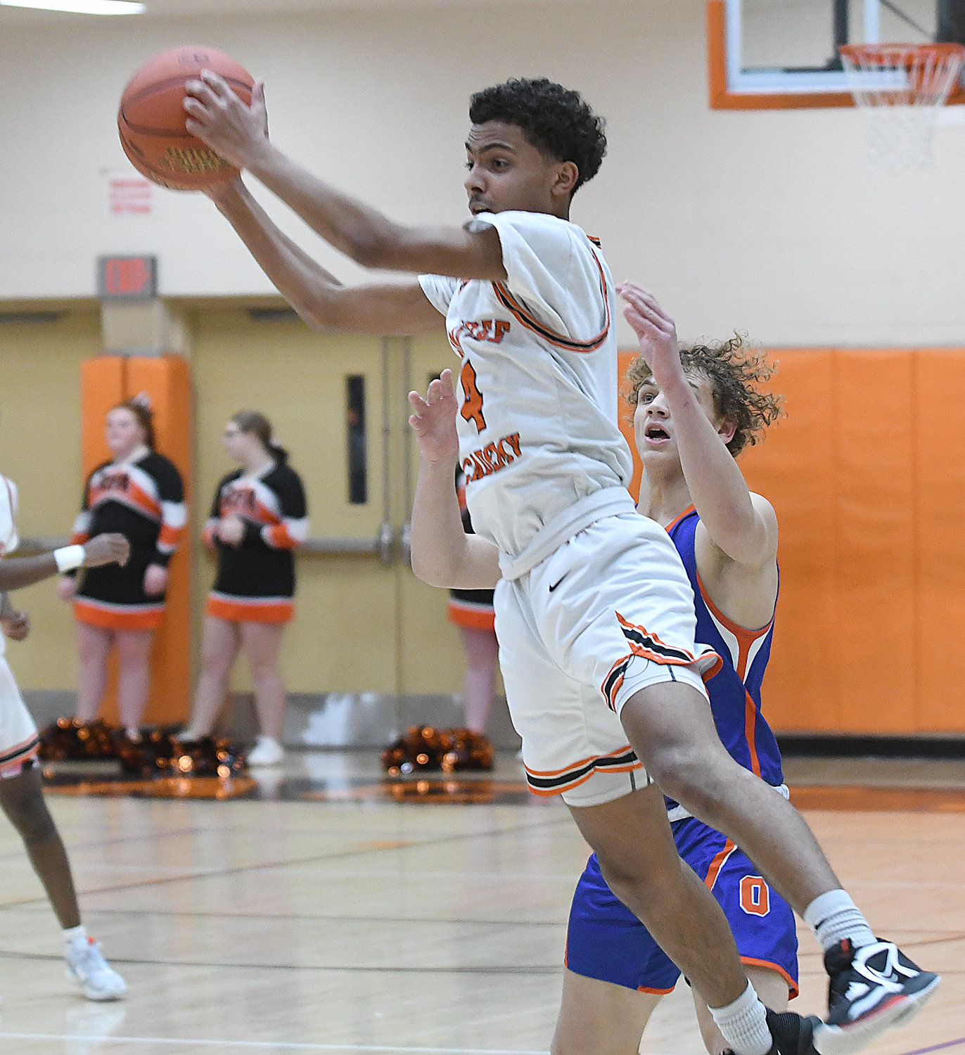 Rome Free Academy freshman guard Surafia Norries picks off a pass in front of Oneida’s Austin Degroat in the first half Friday night at RFA. Degroat led Oneida with 22 points but the Black Knights won 95-80.