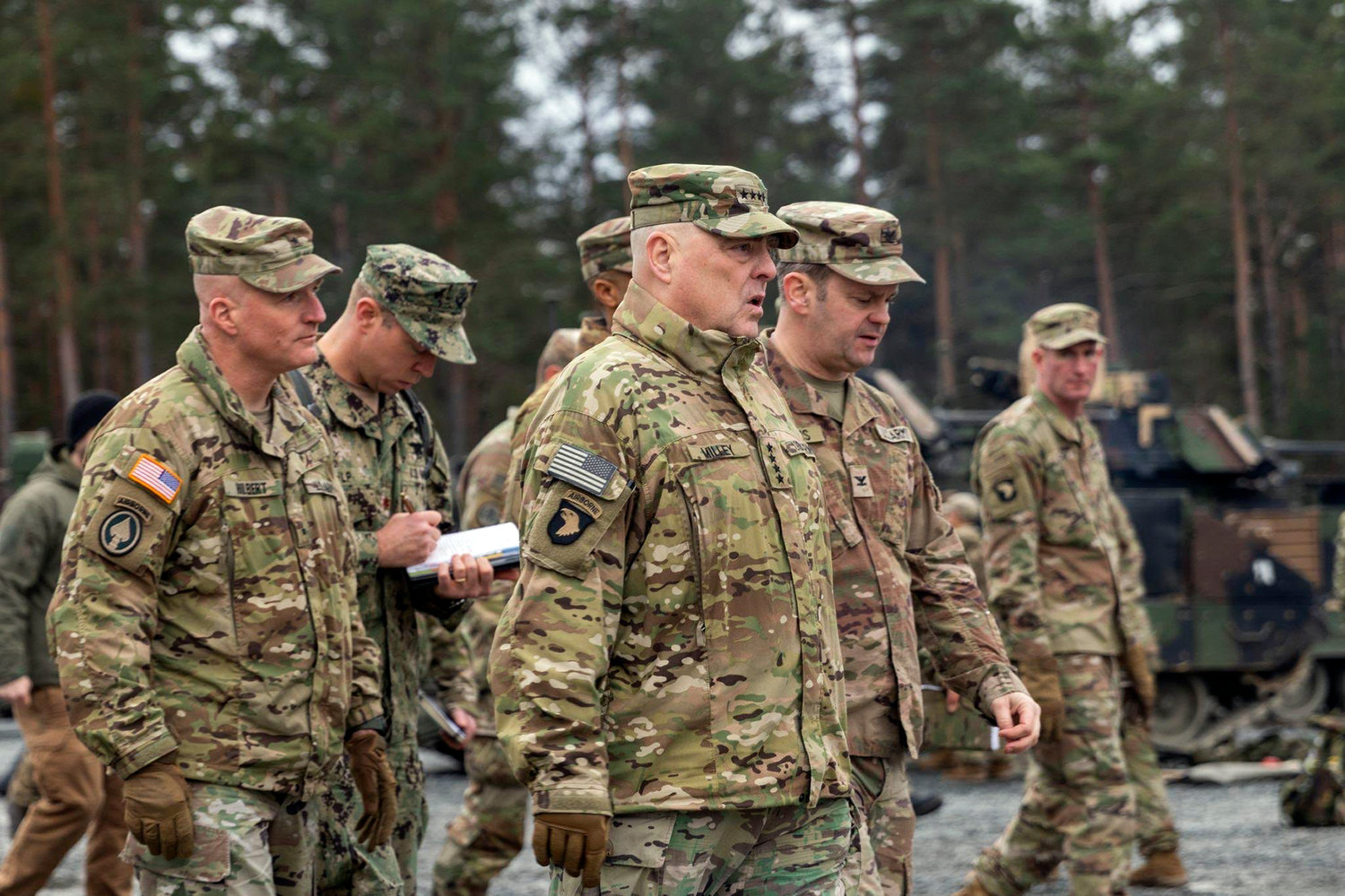 In this image provided by the U.S. Army, U.S. Chairman of the Joint Chiefs of Staff Gen. Mark Milley meets with U.S. Army leaders responsible for the collective training of Ukrainians at Grafenwoehr Training Area, Grafenwoehr, Germany, on Monday, Jan. 16. At left is Brig. Gen. Joseph E. Hilbert, who is the commanding general for the 7th Army Training Command. Milley visited the training site in Germany for Ukrainian forces and met with troops and commanders. The Grafenwoehr Training Area includes a contingent of Army National Guard soldiers typically stationed in Utica.