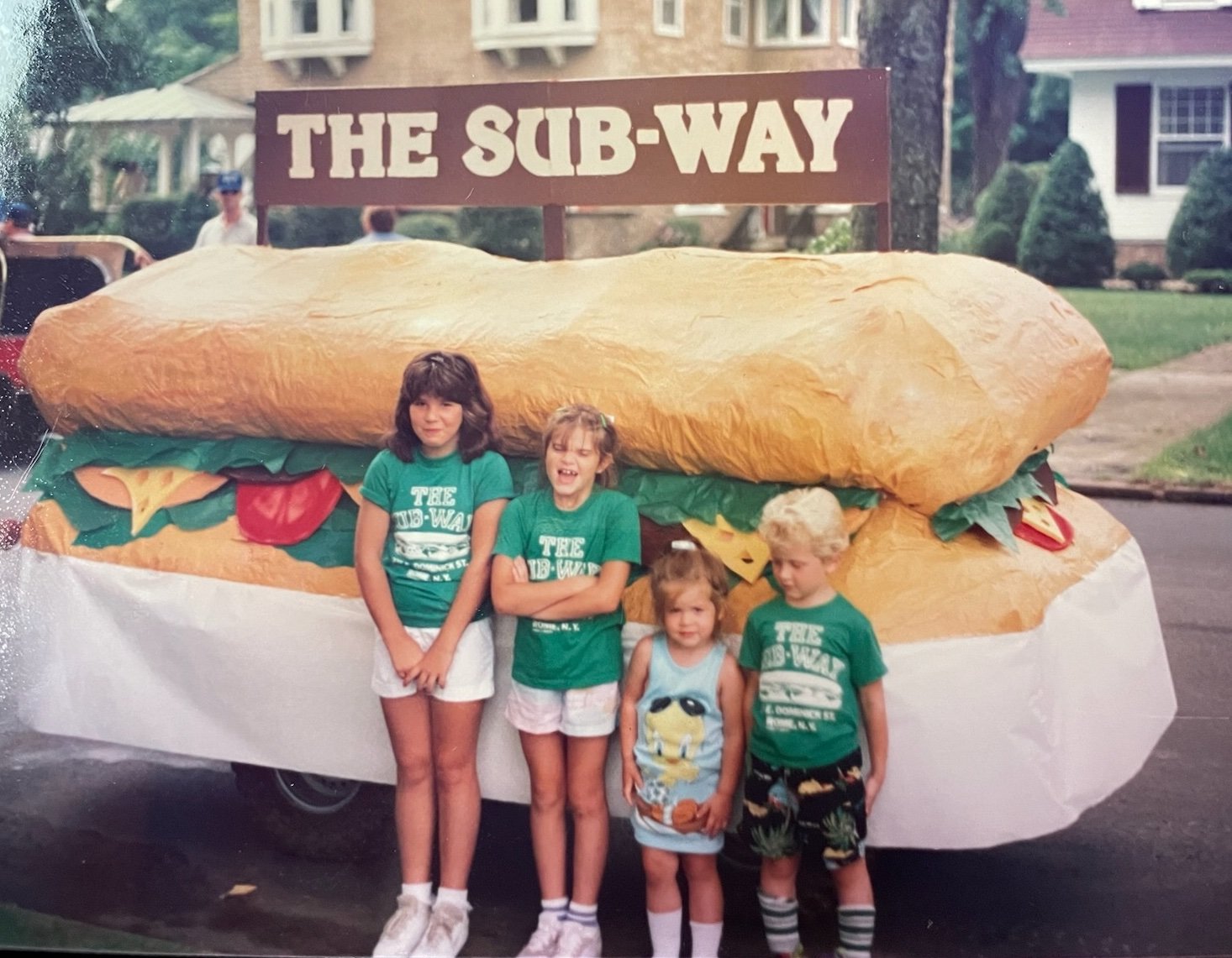 The Cianfrocco kids stand in front of The Sub-Way float, made by then owner Rich Cianfrocco, just before the Honor America Days Parade. From left: Rich and Ann's daughter, Corin, and cousins, Rachel Cianfrocco, Aleisha Cianfrocco and now Firefighter Justin Cianfrocco.