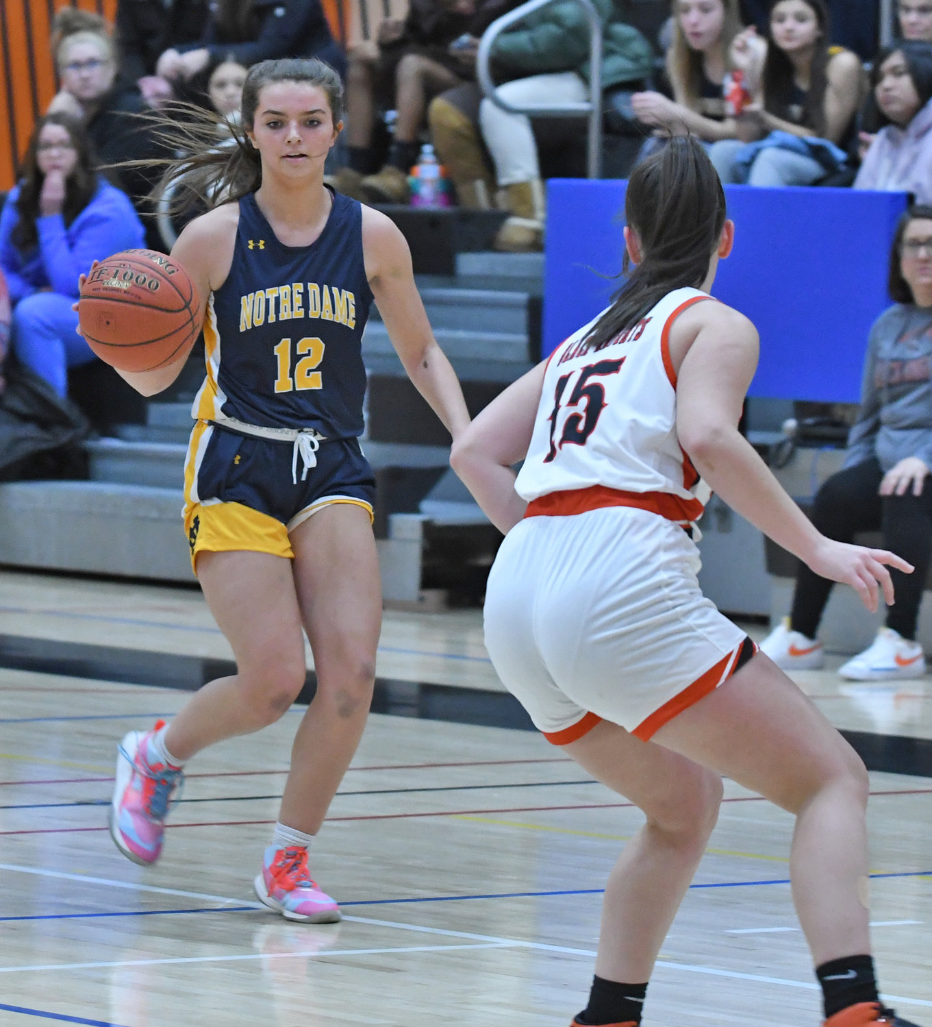 Notre Dame's Sydney Sehring brings the ball up the court with Rome Free Academy's Emma Wright guarding Tuesday at RFA. The Black Knights won 62-54 in a matchup of the teams at the top of the two Tri-Valley League divisions.