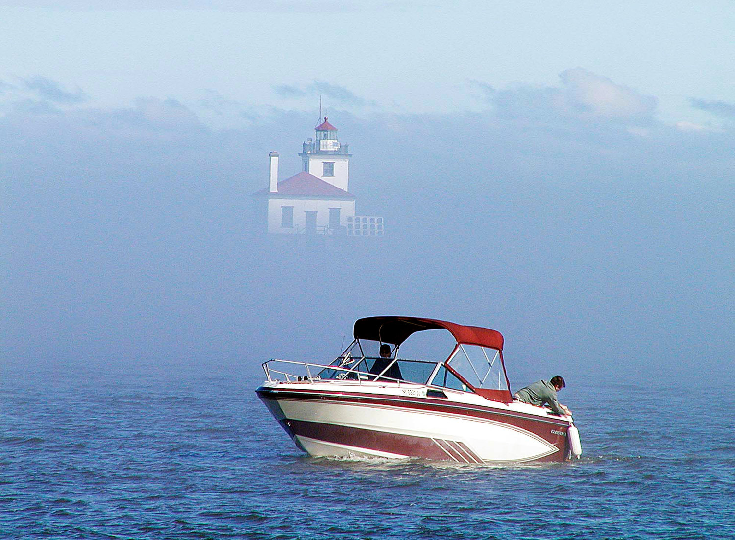 A fishing boat heads into the harbor at Oswego from Lake Ontario in this September 2004 file photo. A proposal to name the lake as a national marine sanctuary by the National Oceanic and Atmospheric Administration has gained steam.