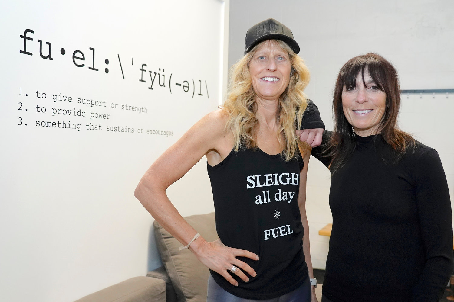 Fuel Training Studio owners Julie Bokat, left, and Jeanne Carter pose for a photo inside their gym, Thursday, Jan. 19, in Newburyport, Mass.