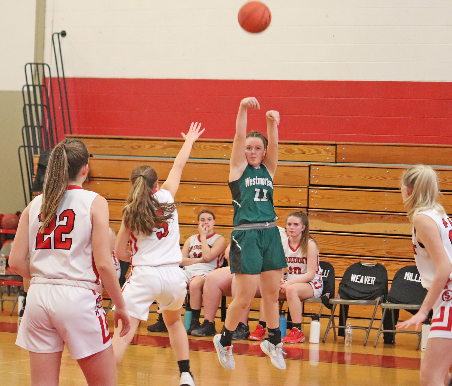 Westmoreland’s Julianna Otis launches a shot at Sauquoit Valley Saturday. The Bulldogs won 45-34.