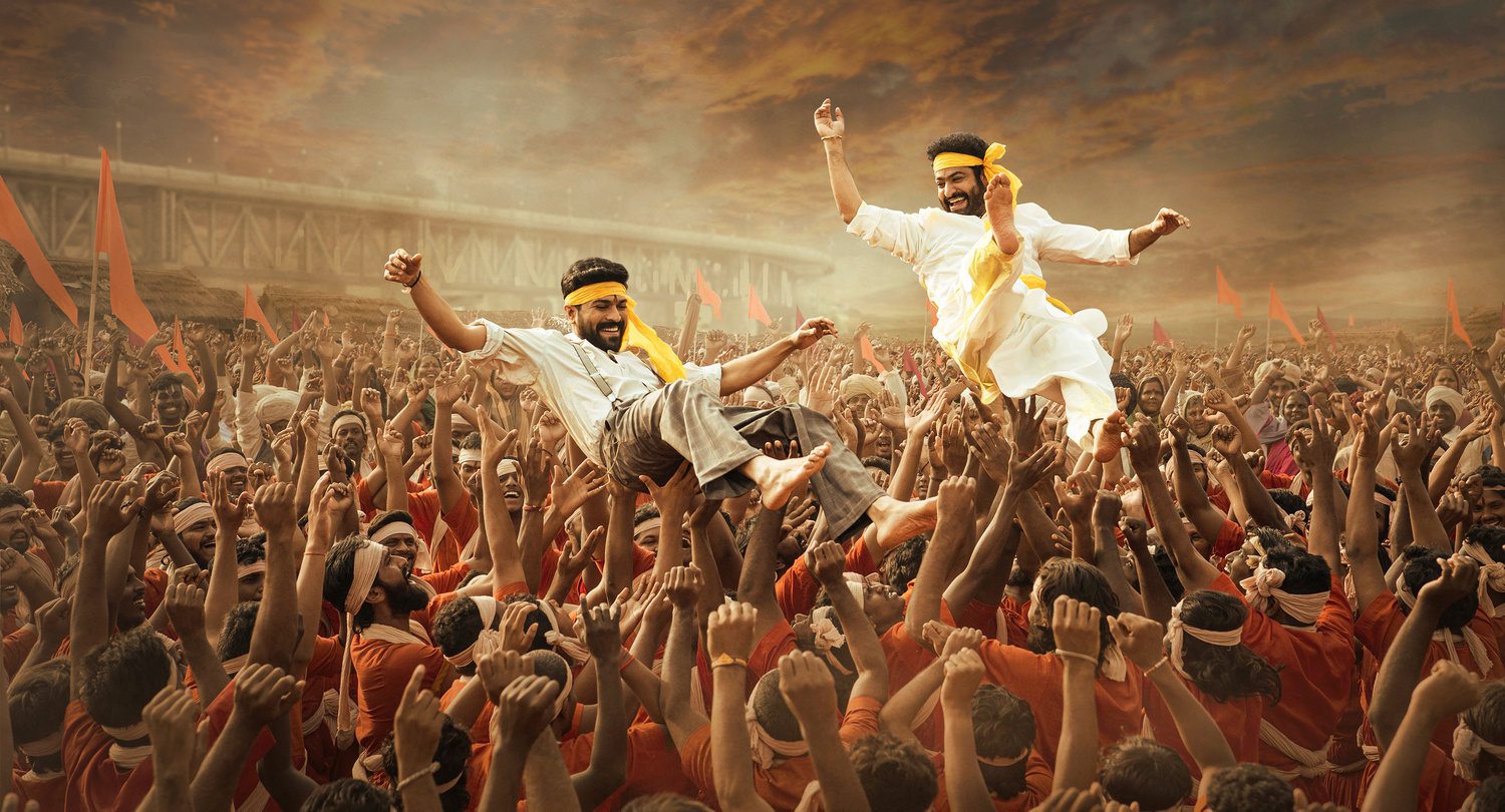 This image released by Netflix shows Ram Charan and N.T. Rama Rao Jr. in a scene from "RRR."