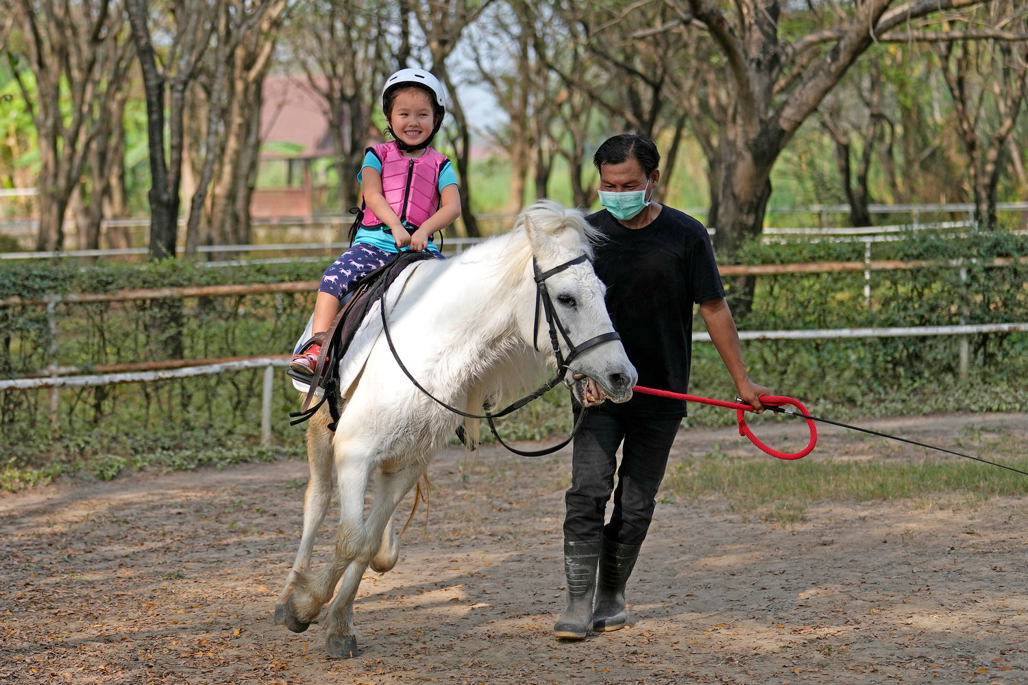 Rylae-Ann Poulin learns to ride a horse in Bangkok, Thailand, Saturday, Jan. 14.