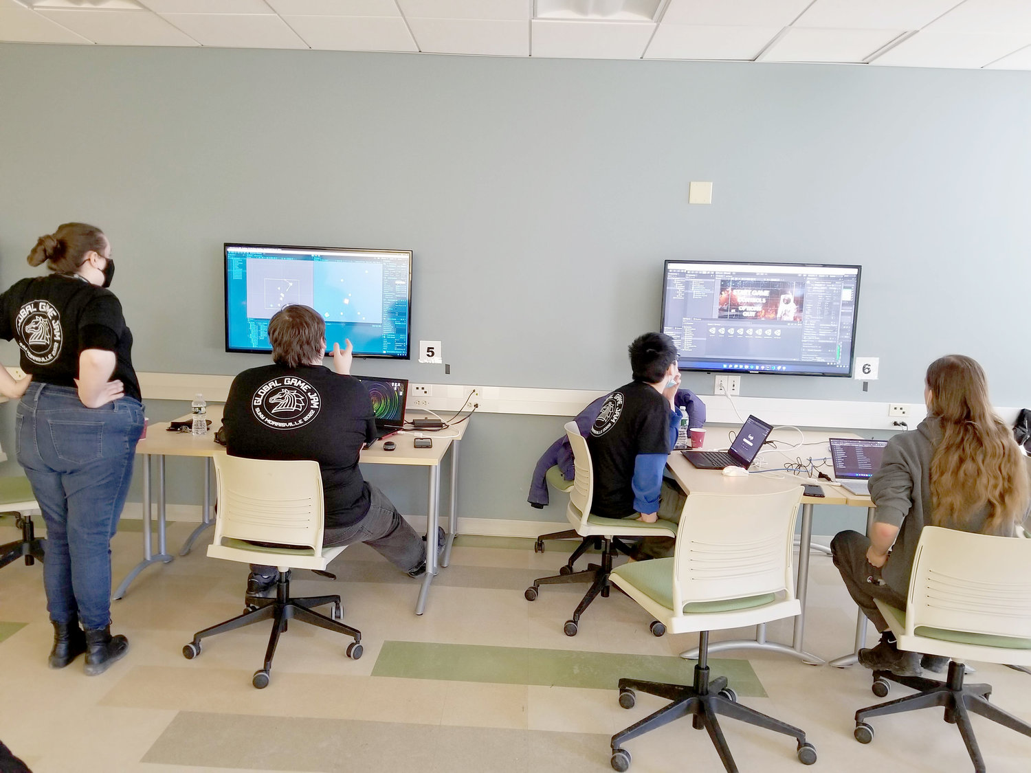 Past participants of the SUNY Morrisville Game Jam, working to create a video game.