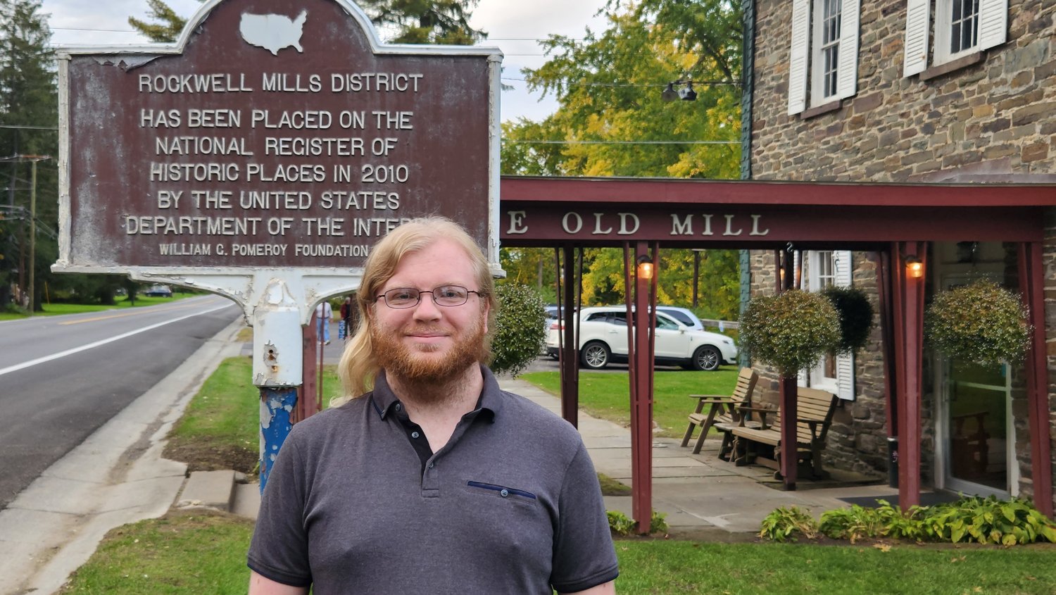 Zachary Greenfield, newly appointed Chenango County Historical Society archives and collections coordinator, visits regional landmark The Old Mill, located in the town of Guilford’s Rockwell Mills District.