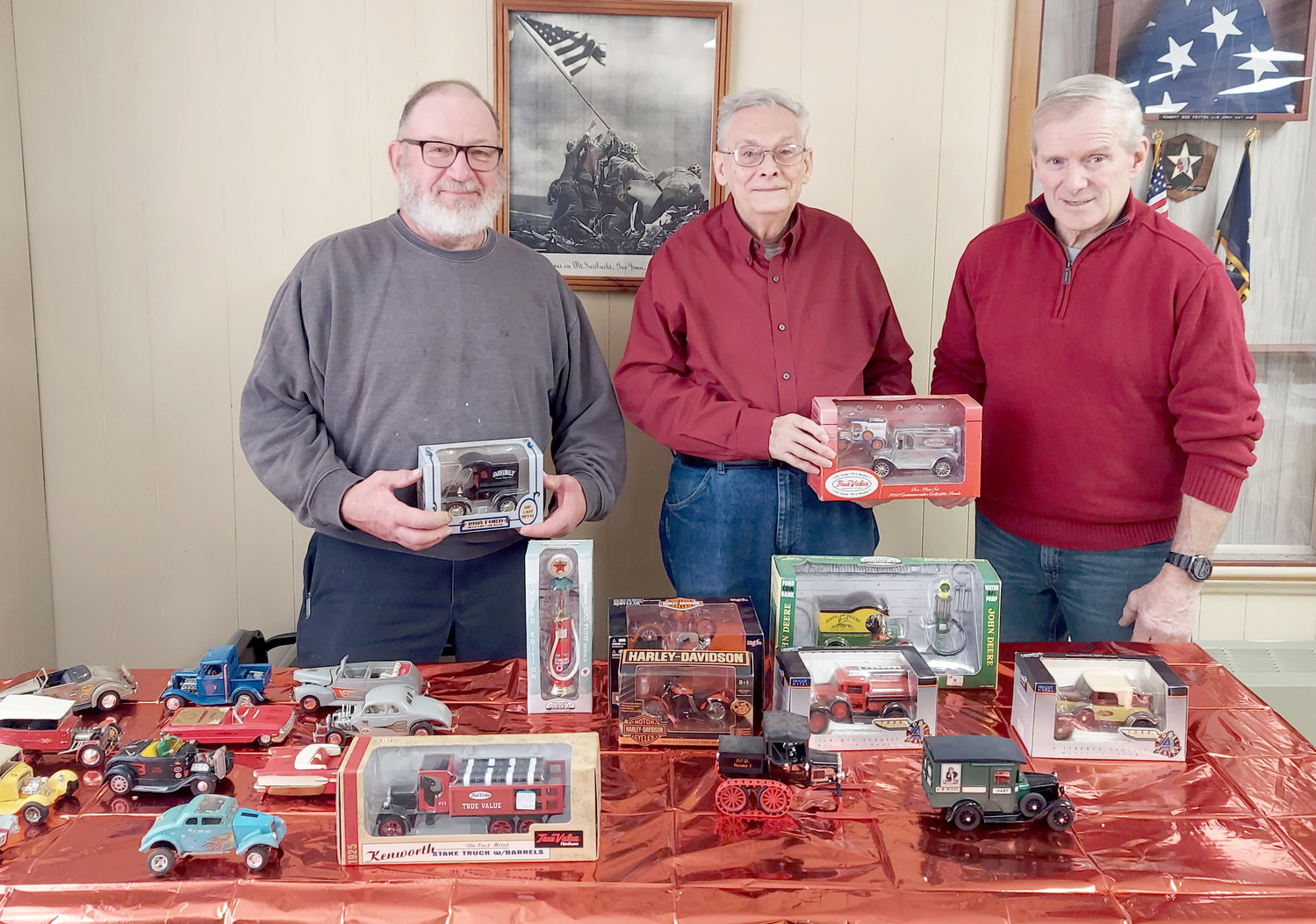 The Oriska Valley Seniors met on Thursday, Jan. 5, at the American Legion in Oriskany Falls.  The speaker was Mike Silliman, a member of the Mohican Model A Ford Club, who talked about his collection of model cars and die-cast banks with a display of cars. The presentation included a discussion of the early years, 1898-1931, that Henry Ford manufactured cars. In 1924, he produced his 10 millionth Model T. In 1927, he manufactured his last Model T. In 1928, production started on Model A’s which ended in 1931 when he manufactured his 5 millionth Model A. From left: Howard Henty; Mike Silliman, and Eric Howard.