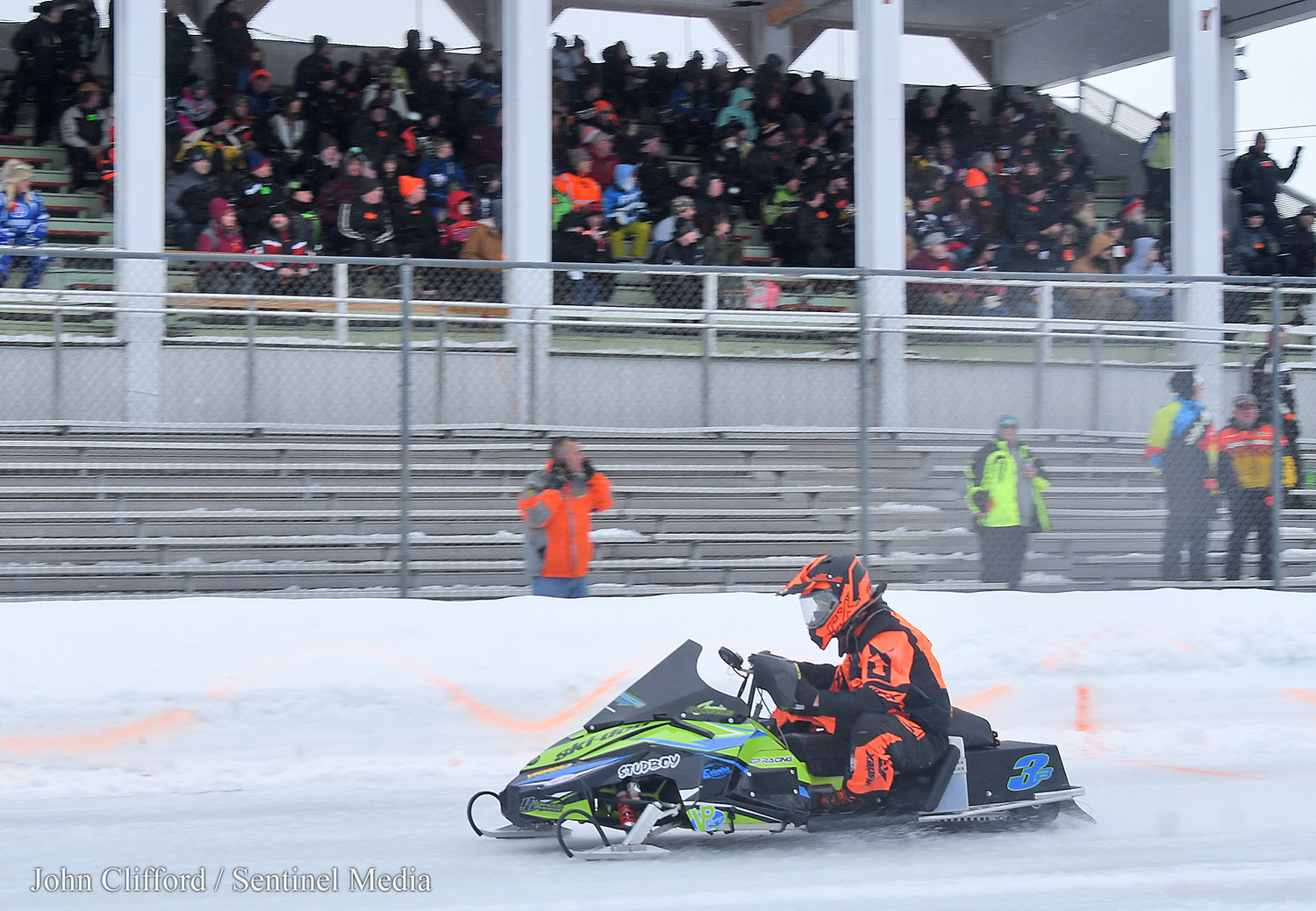 Boonville's Jamie Bourgeiois streaks by the Snow Festival crowd on his way to winning the Pro Champ Adirondack Cup Sunday afternoon at Boonville Fairgounds. It was Bourgeois first win in the race that said in victory lane he has been dreaming of winning for over 15 years.