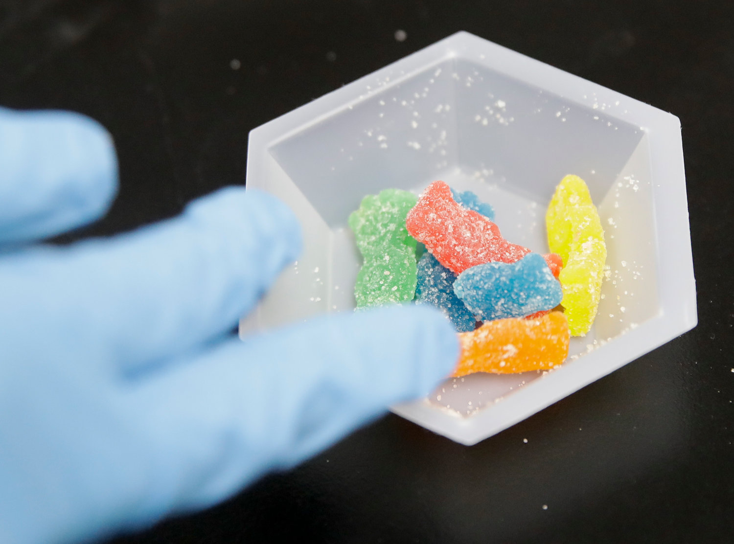 Edible marijuana samples are set aside for evaluation at a cannabis testing laboratory in this AP file photo. These new medicinal products can resemble candy and parents are encouraged to warn their children about them.