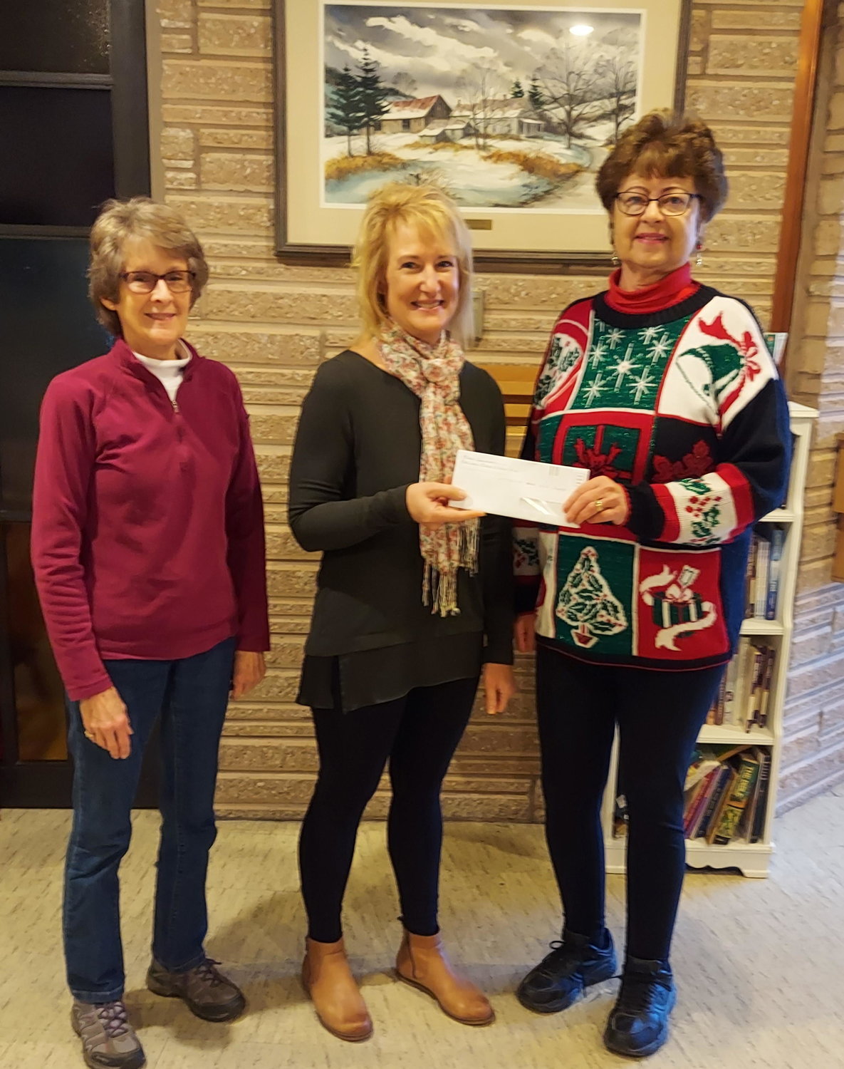 The Mohican Model A Ford Club has announced the organization has made three recent charitable donations. From left: Secretary and Treasurer Suzanne Getman; Chairperson Mary Beth Plourde; and Mabel Silliman, Mohican Model A Ford Club.