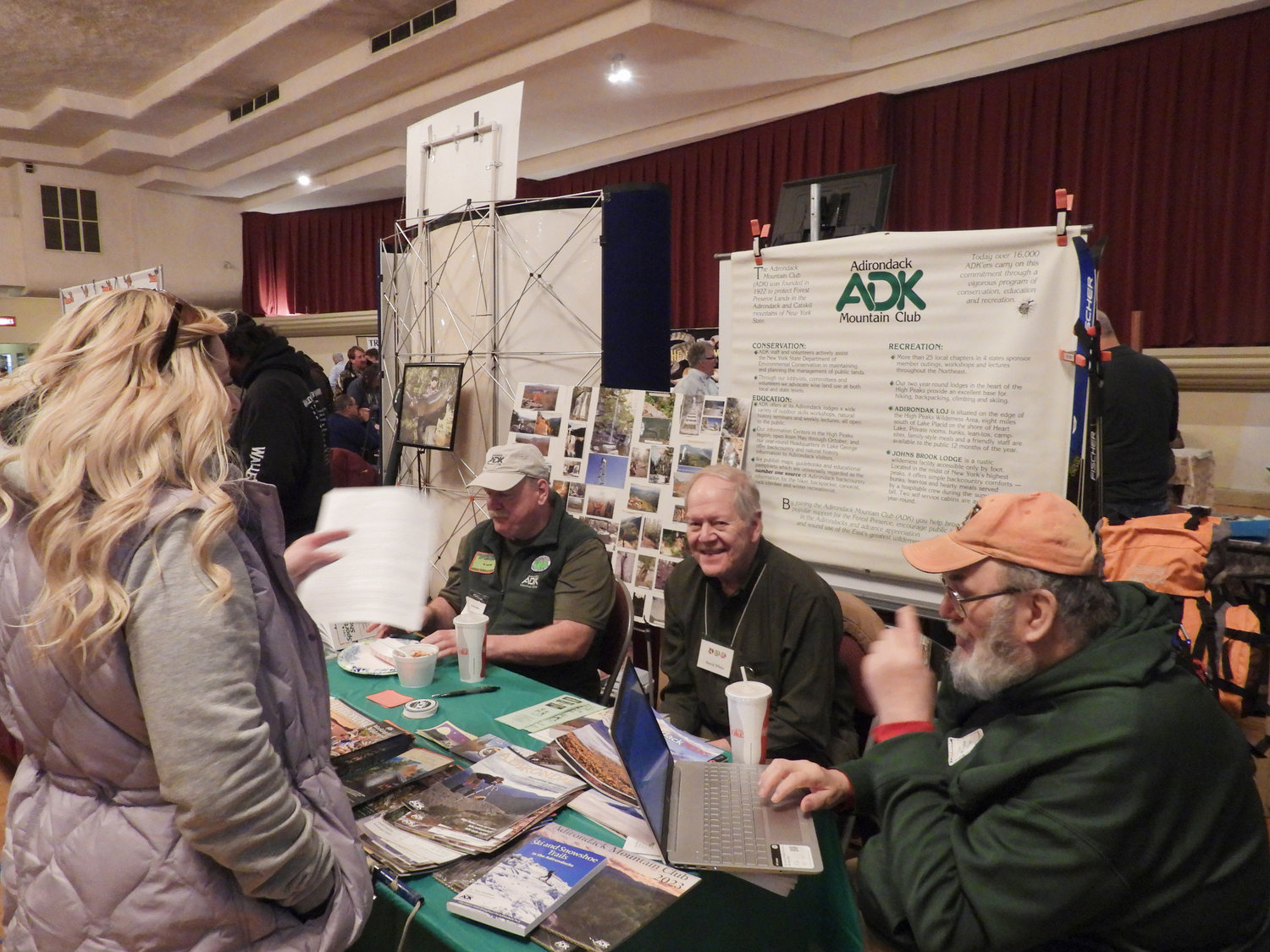 Members of the Adirondack Mountain Club speak with prospective members at the CNY Sportsman Show on Saturday, Feb. 4 at the Kallet Civic Center in Oneida.
