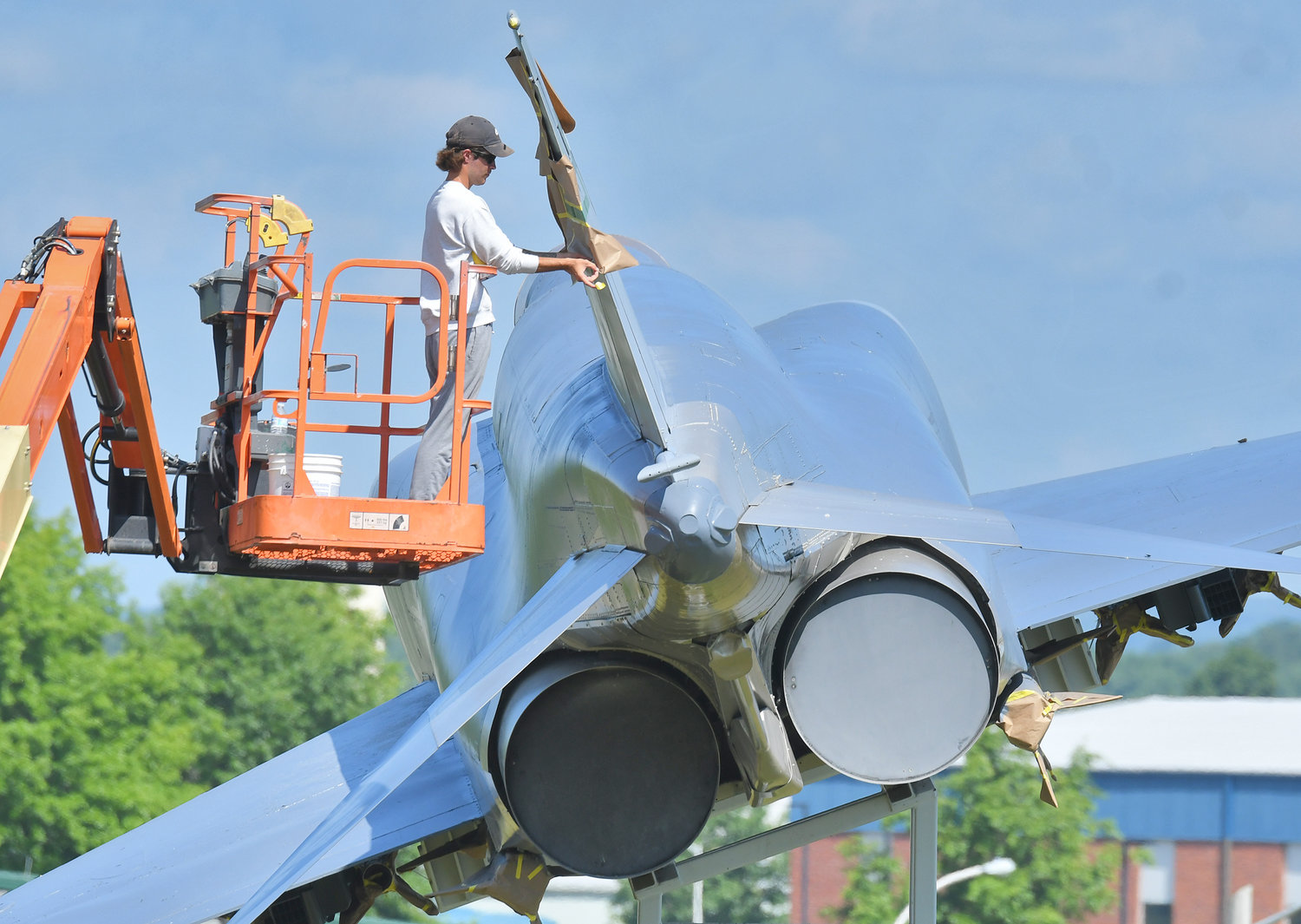 A worker helps maintain the F-4 Phantom jet on static display at the Eastern Air Defense Sector at the Griffiss Business and Technology Park in this Daily Sentinel file photo.  Military officials said EADS played an integral role in the recent tracking and shooting down of a suspected Chinese spy balloon earlier this week.