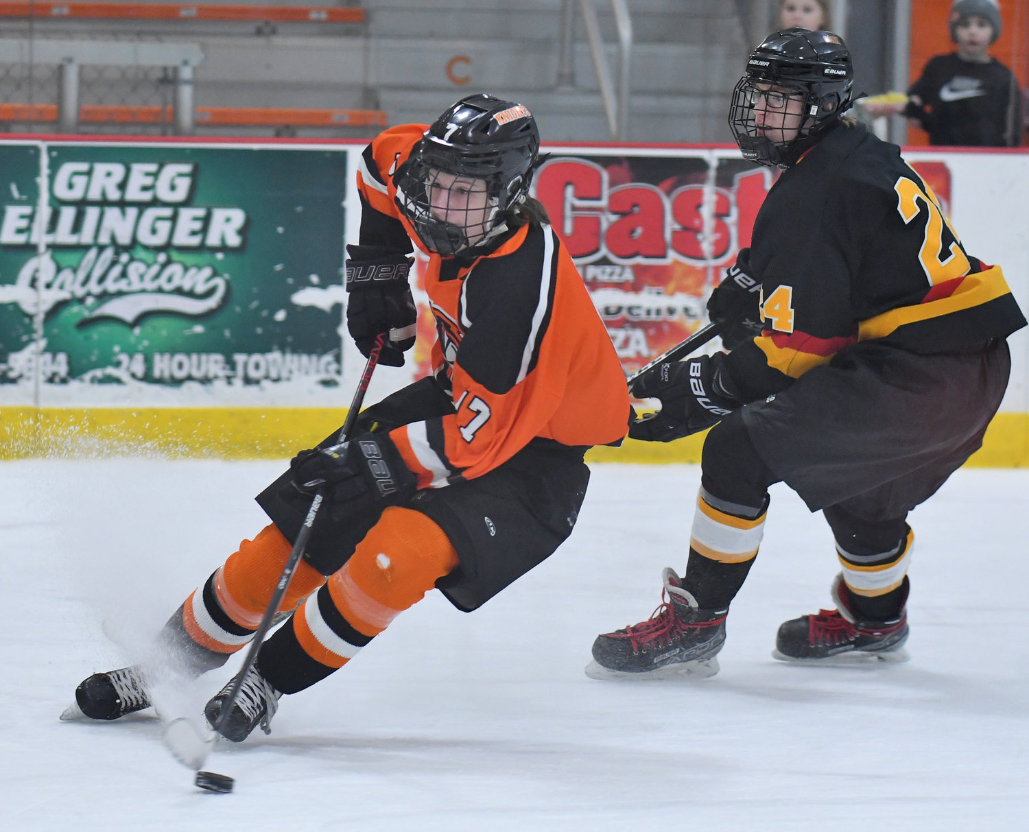 Rome Free Academy's Jimmy DeAngelo makes a quick cut with Ontario Bay's Bradyn Walker in pursuit in the first period Tuesday night at Kennedy Arena. RFA lost 5-4 in overtime.