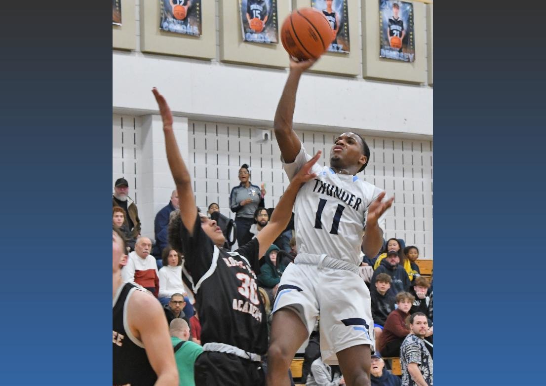 Central Valley Academy’s Jaylon O’Neal goes up for a shot against Rome Free Academy’s Surafia Norries on Jan. 27 in Ilion. O’Neal scored a career-high 44 points and set the school’s single-game scoring record in CVA’s 82-57 win over Vernon-Verona-Sherrill on Tuesday night in Verona.