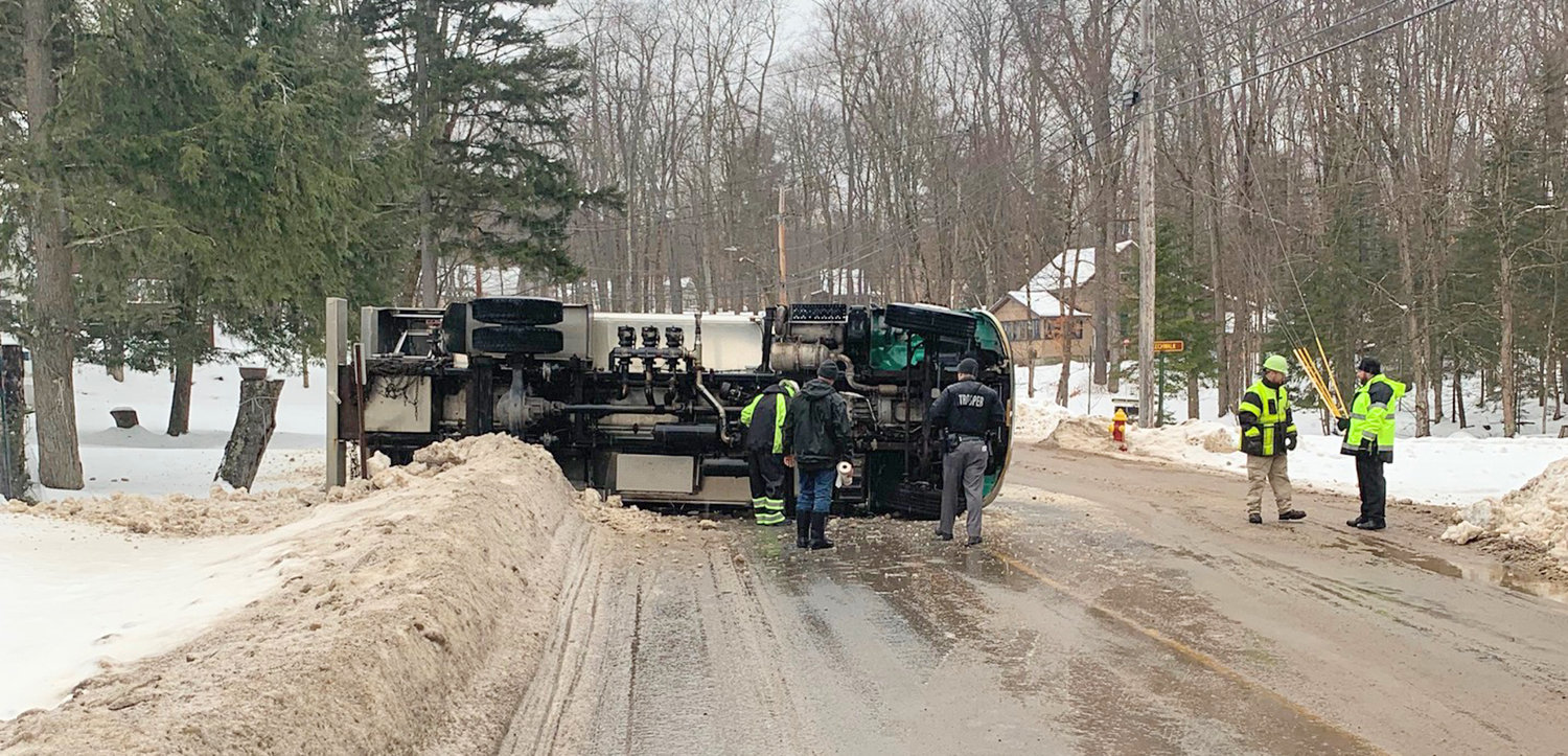 An icy South Shore Road in the Town of Webb in Herkimer County caused this fuel truck to overturn Thursday morning, according to the Webb Police Department. The driver was not injured and the truck was lifted with only a small amount of fuel leaking out, police stated.