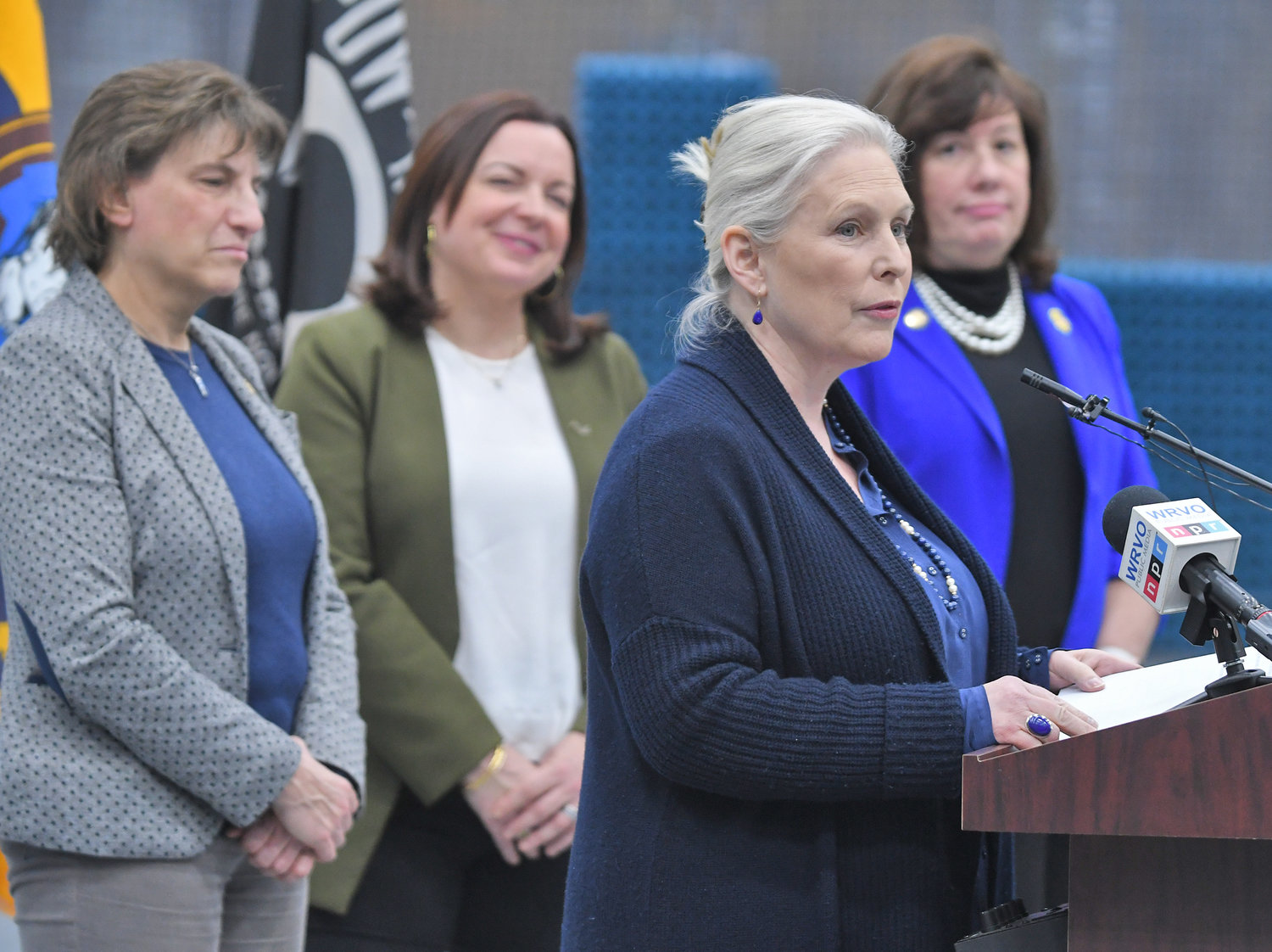 US Sen. Kirsten Gillibrand talks at Innovare Advancement Center with Rome Mayor Jacqueline Izzo; Heather Hage, President and CEO of the Griffiss Institute; and Assemblymember Marianne Buttenschon in the background Friday afternoon February 10.
