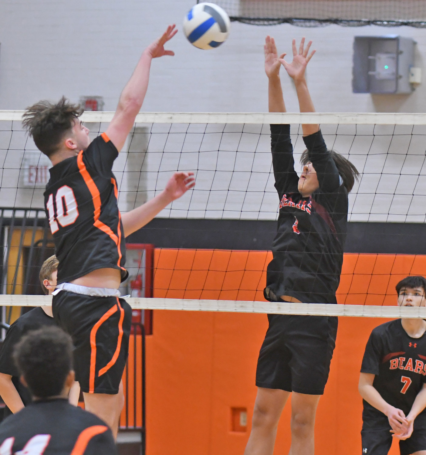 Casey Podkowka of Rome Free Academy looks for a kill with Chittenango's Landon Parks defending at Strough gym in Rome on Thursday. Podkowka had three kills but RFA lost in three sets.