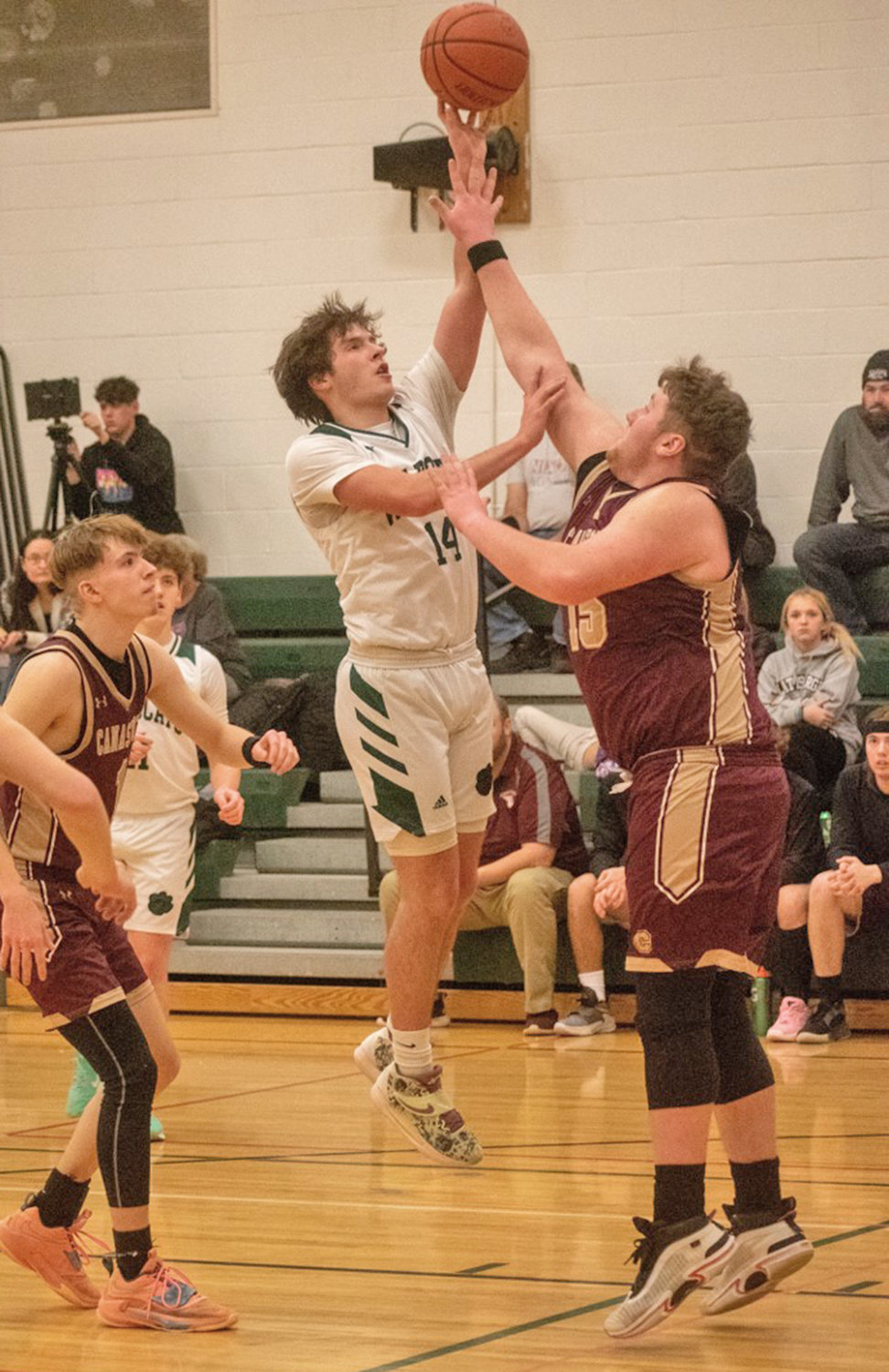 Maxim Weiler of Adirondack is challenged by Canastota's Caiden Bonneau in a game at home Friday. The Raiders won 51-38 on the road.