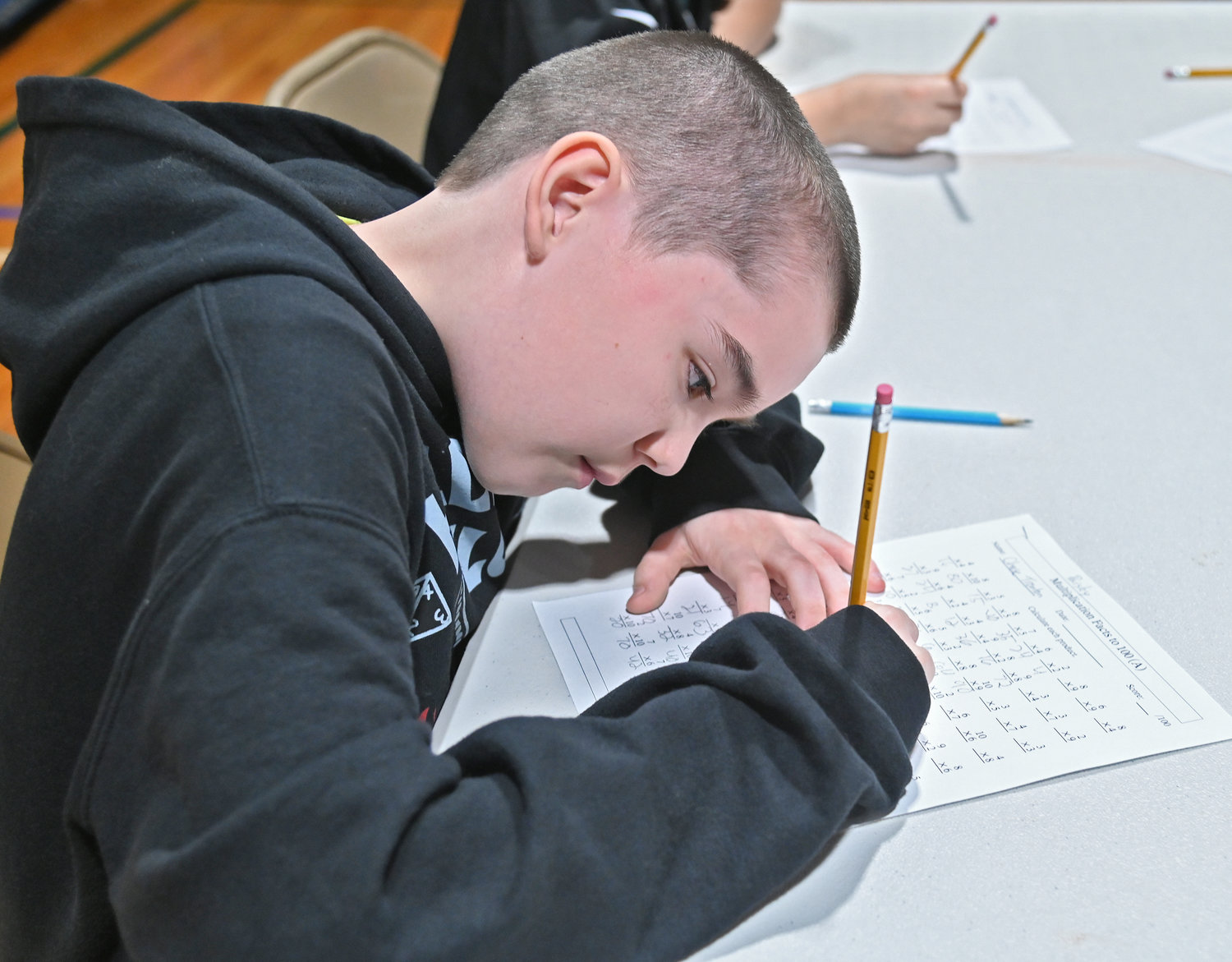Gansevoort Elementary School sixth grader Chase Trenton powers through his math problems Friday, Feb. 10 during the Math Fact Super Bowl STEM finals.