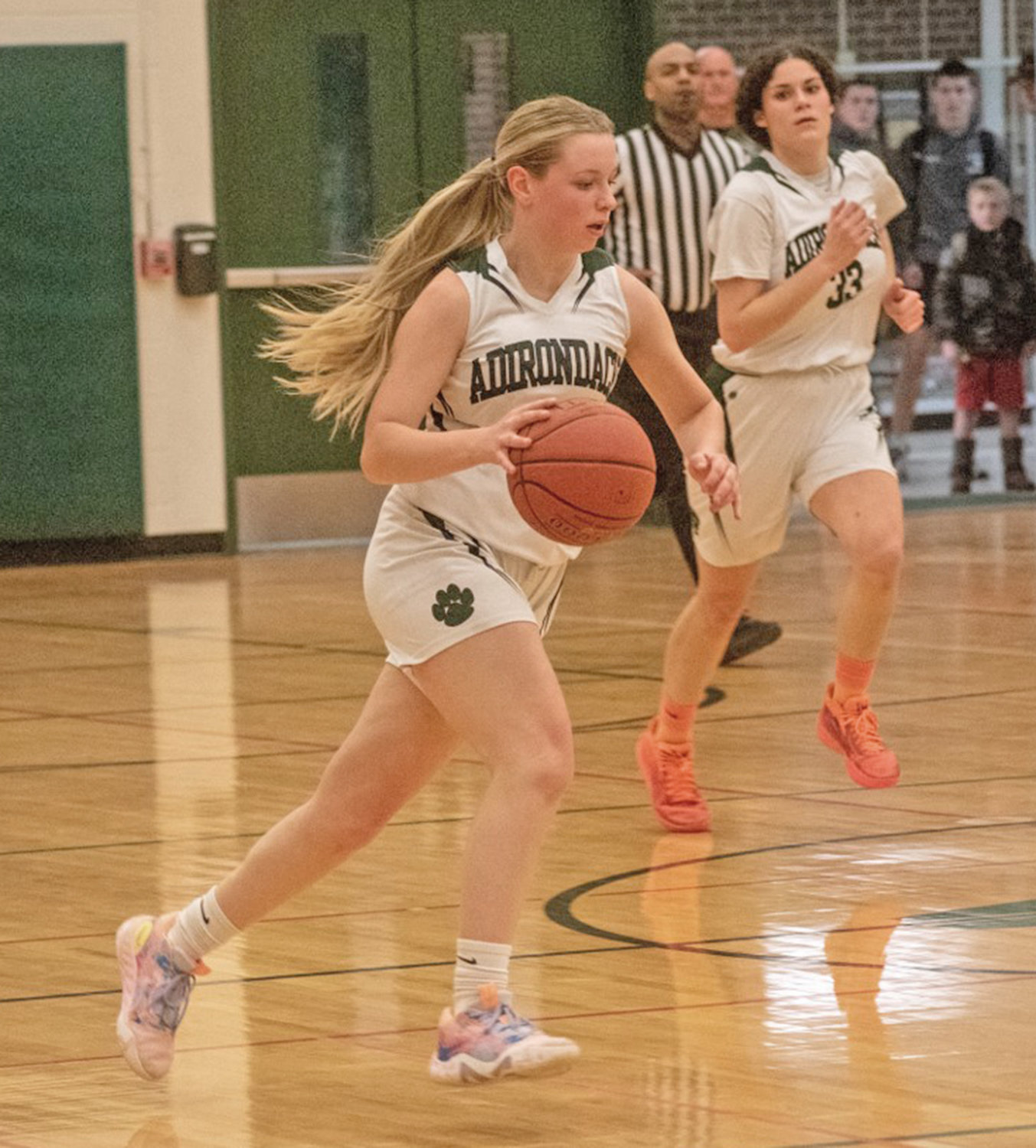 Ireland Payne brings the ball up the court for Adirondack Monday at home against West Canada Valley. At right is teammate Rebeckah Tittle. Tittle led the team with 11 points and Payne had 10 but the Wildcats lost 59-46.