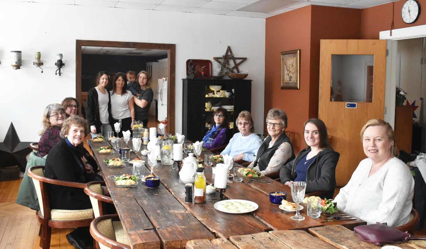 A group of Boonville Herald staff, past and present, recently enjoyed a tour and luncheon at the Restoration House in Constableville. They are in the large dining room, located upstairs, where there’s also a large kitchen, additional bedrooms, laundry room, etc., as well as a hallway filled with beautiful furniture. Standing are the hosts, from left: Alezi Zehr, Leticia “Tish” Zehr, and Courtney (Zehr) Lubula holding her son Joshua. Seated, at left, front to back are Jane Sanford, Cindy Pritchard and Dawn Pfendler. Seated at right, front to back, Eileen Pierson, business manager for the Boonville Herald/Daily Sentinel; Dina Olmstead, staff writer; Jeannie Wiedmer, Arleen Walston, and Sandra Hrim, Boonville Herald editor. Missing from photo is photographer Nichole Moore.