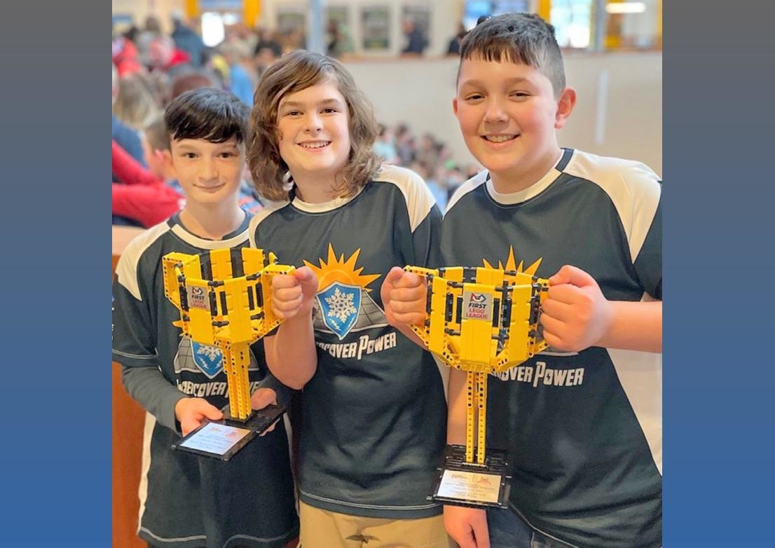 Clinton Central School seventh graders, from left, Ben Wileczka, Jack Wilson and Nicholas  Venero, recently won the Champion’s Award at the FIRST LEGO League Regional Championship at Clarkson University.