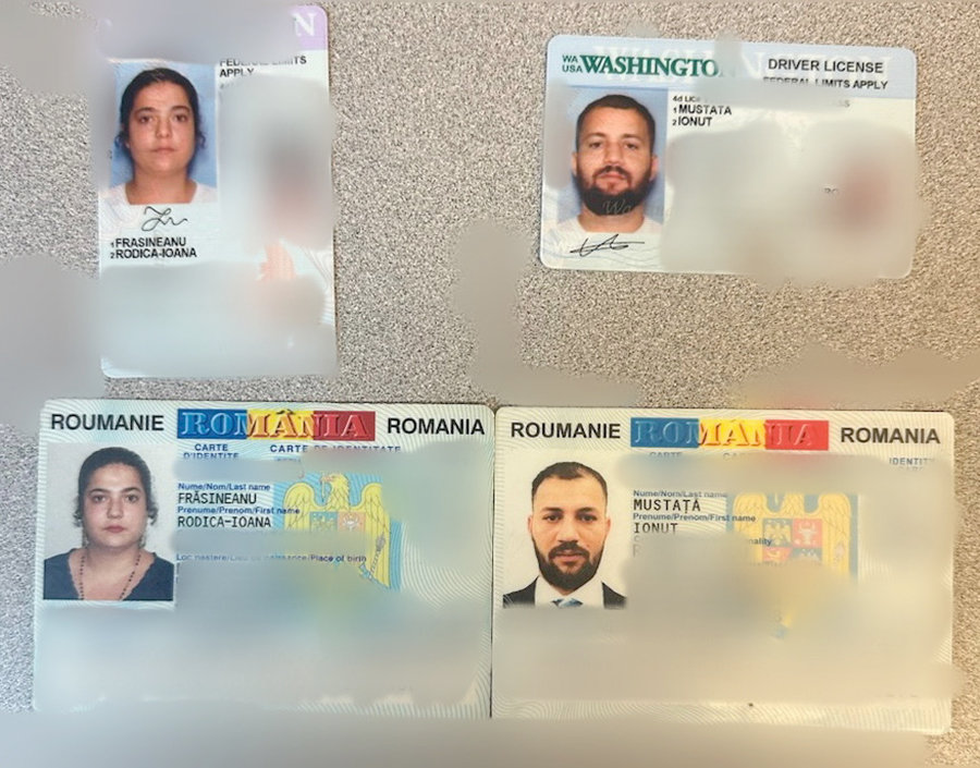 ID from the State of Washington and Romania for the man and woman charged in Oneida with trying to scam people with fake products, according to the Oneida Police Department.