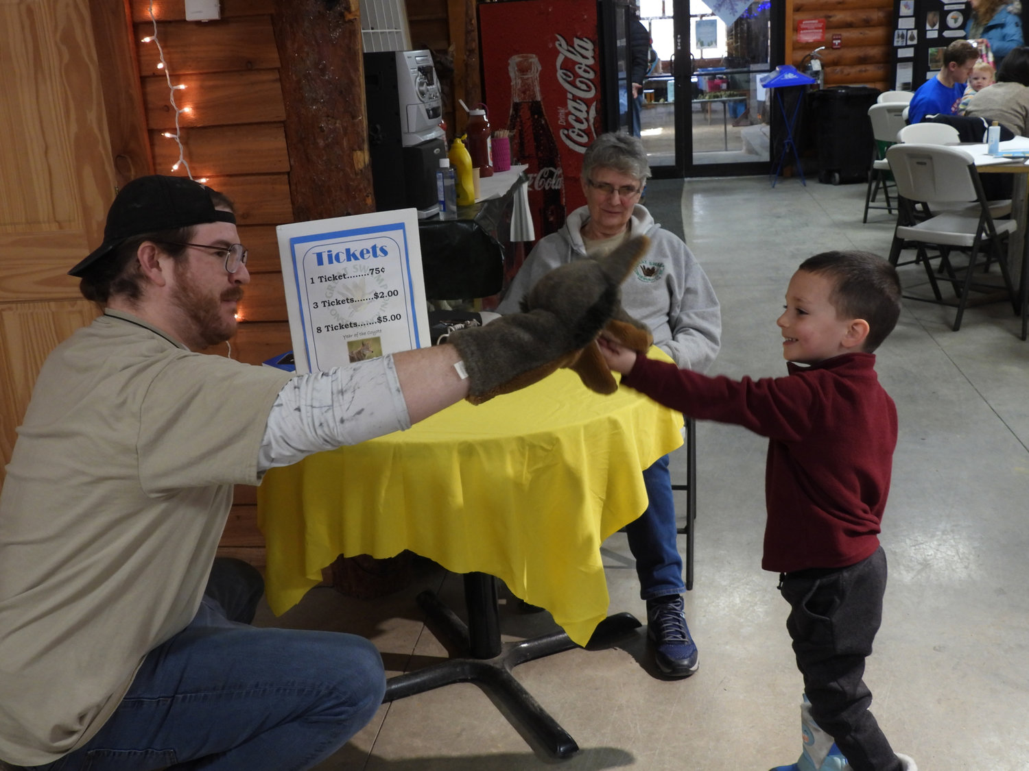 GSC Environmental Educator Jack Silky makes a child smile at the Great Swamp Conservancy's Winter Hibernation Festival on Saturday, Feb, 18