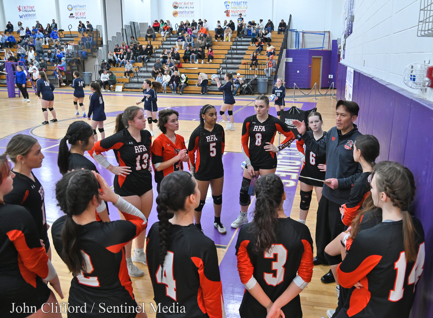 Rome Free Academy Black Knights girls volleyball team prepare for their game with Whitesboro in the Class A finals at Case Middle School in Watertown.
