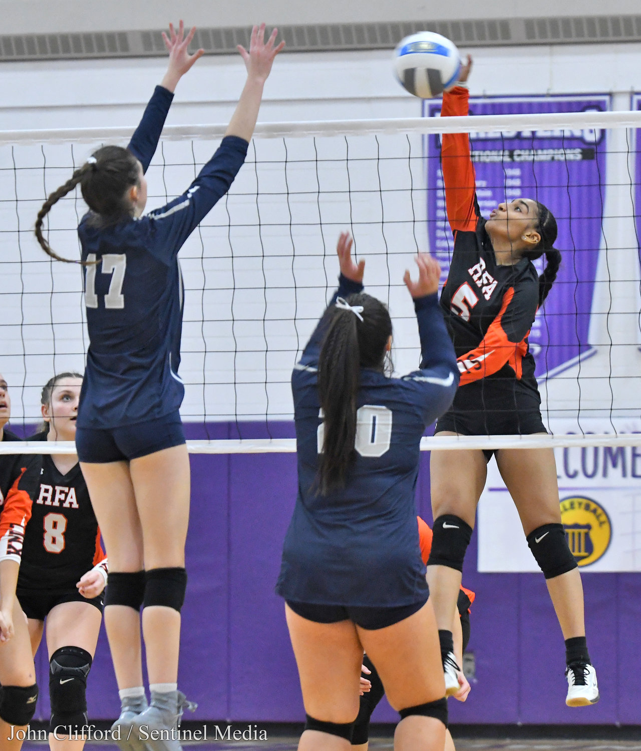 Rome Free Academy #5 Kassity Cruz makes a kill in front of Whitesboro #17 Eva Quackenbush and #20 Kylee DeCarr Saturday afternoon in Watertown.